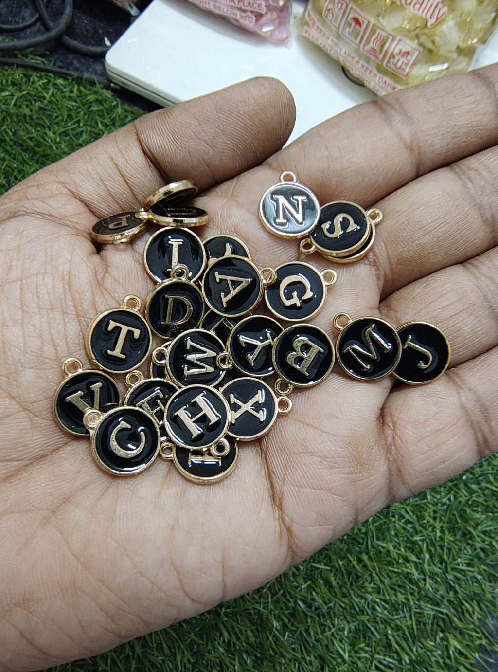 Round black alphabet charm( a to z) ( EC1003 )