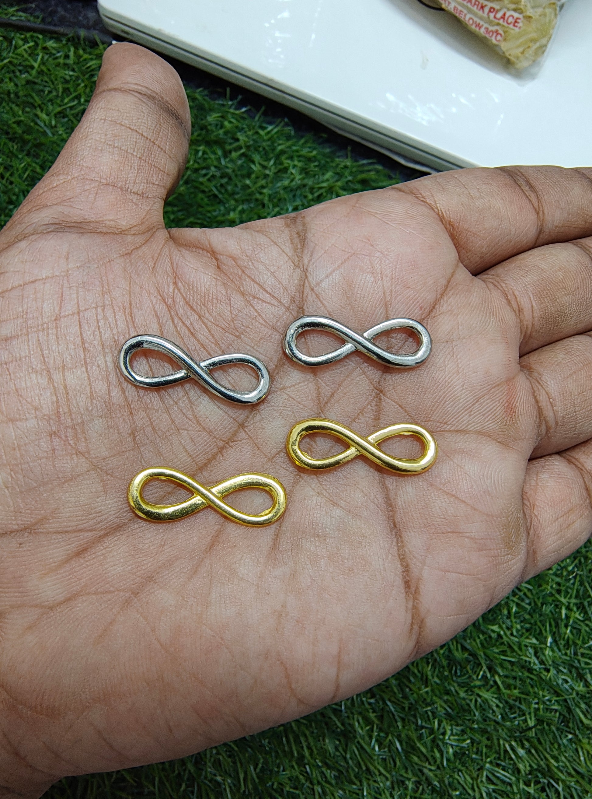 Infinity metal charm
