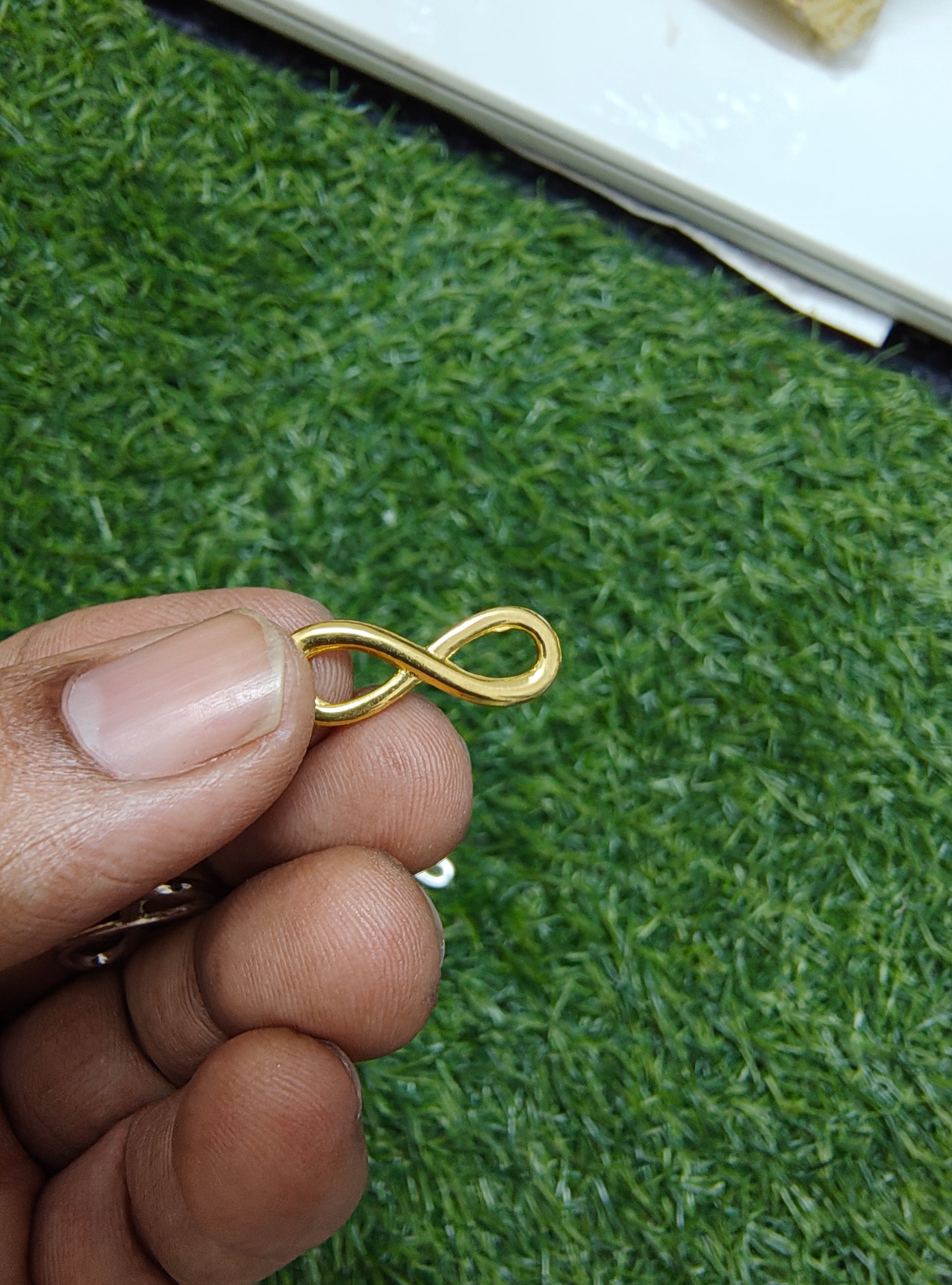 Infinity metal charm