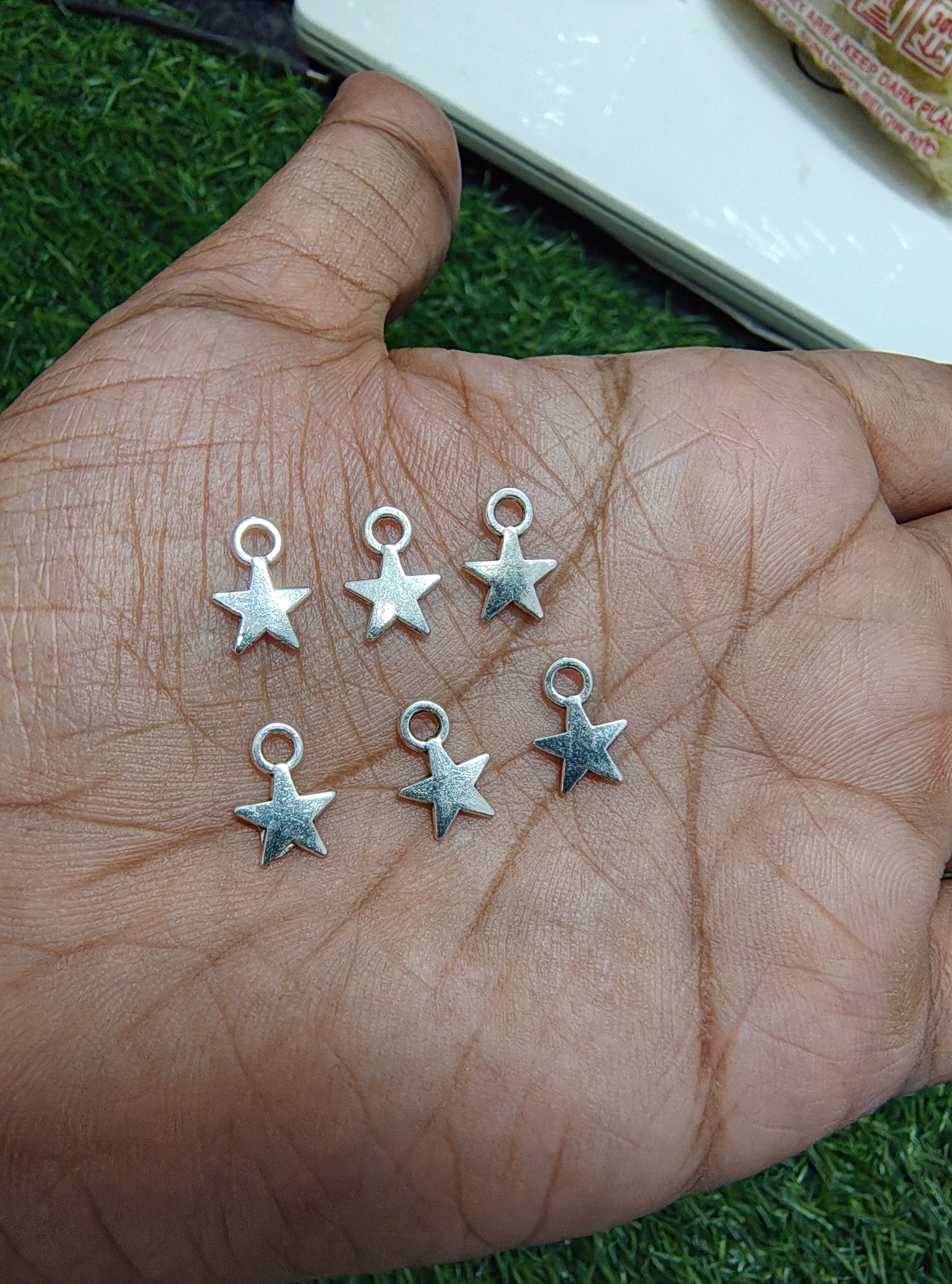 Small star metal charm
