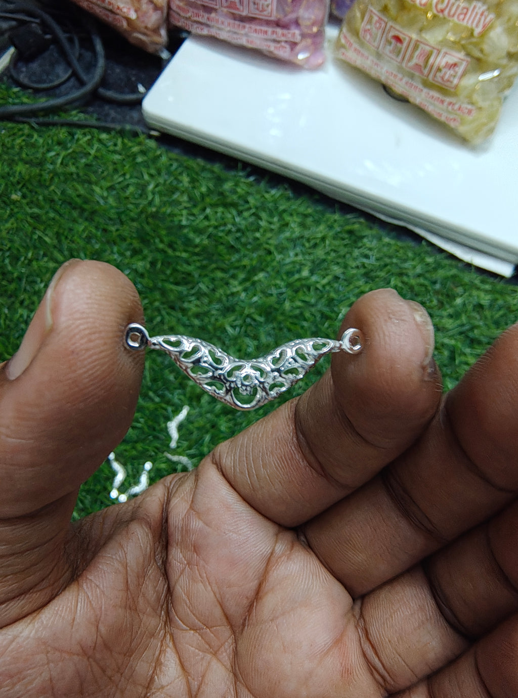 Mangalsutra type metal charm