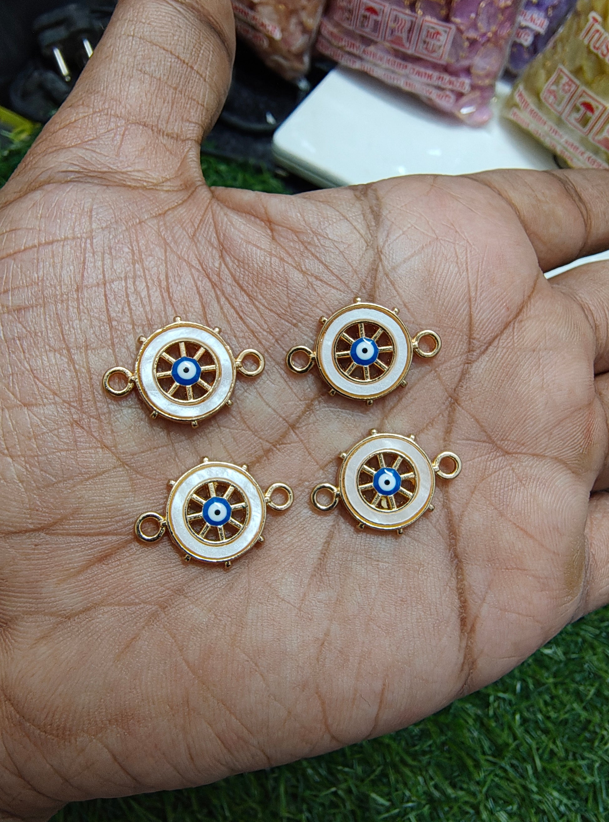 Wheel evil eyes charms