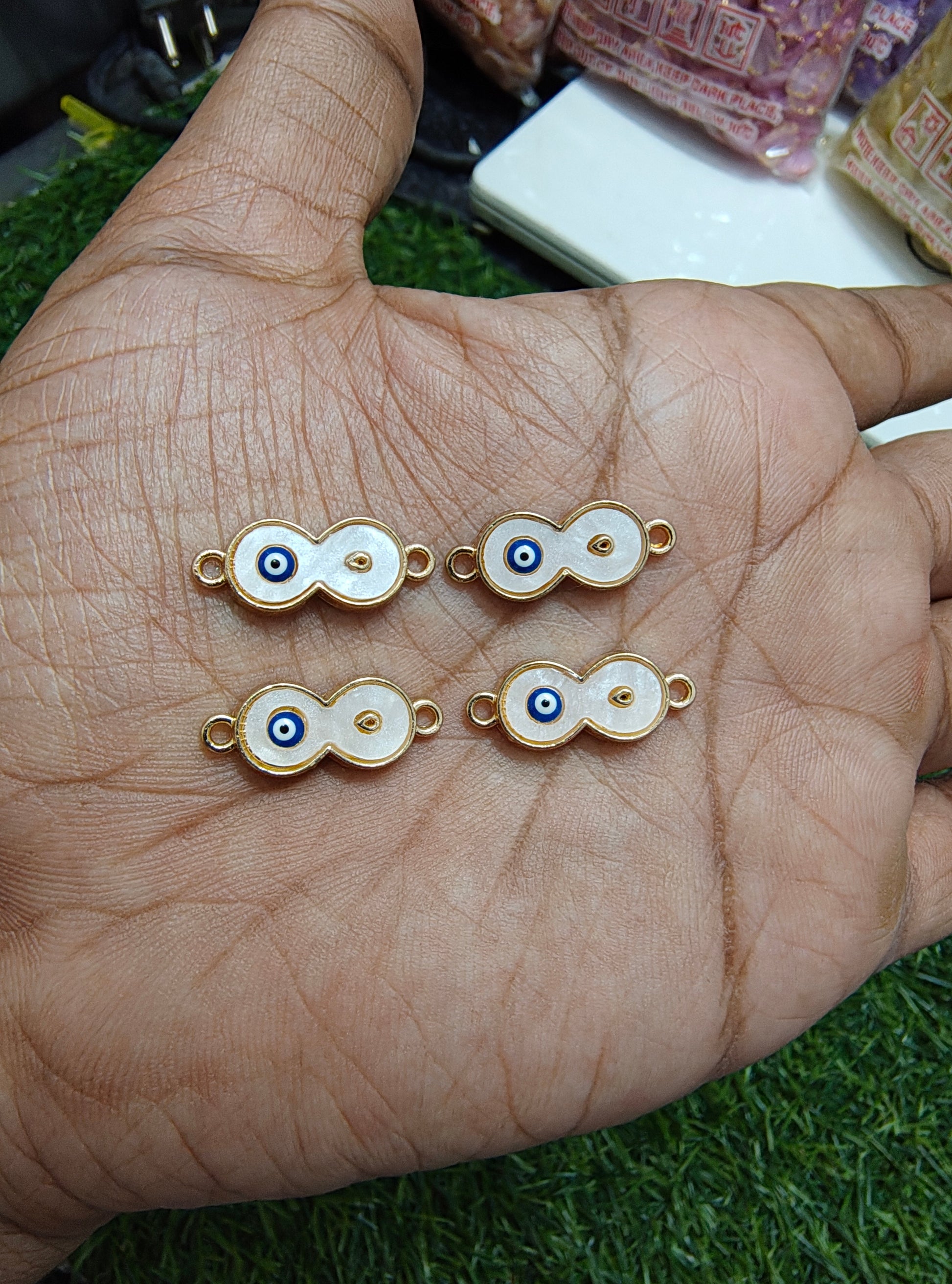 White infinity charm