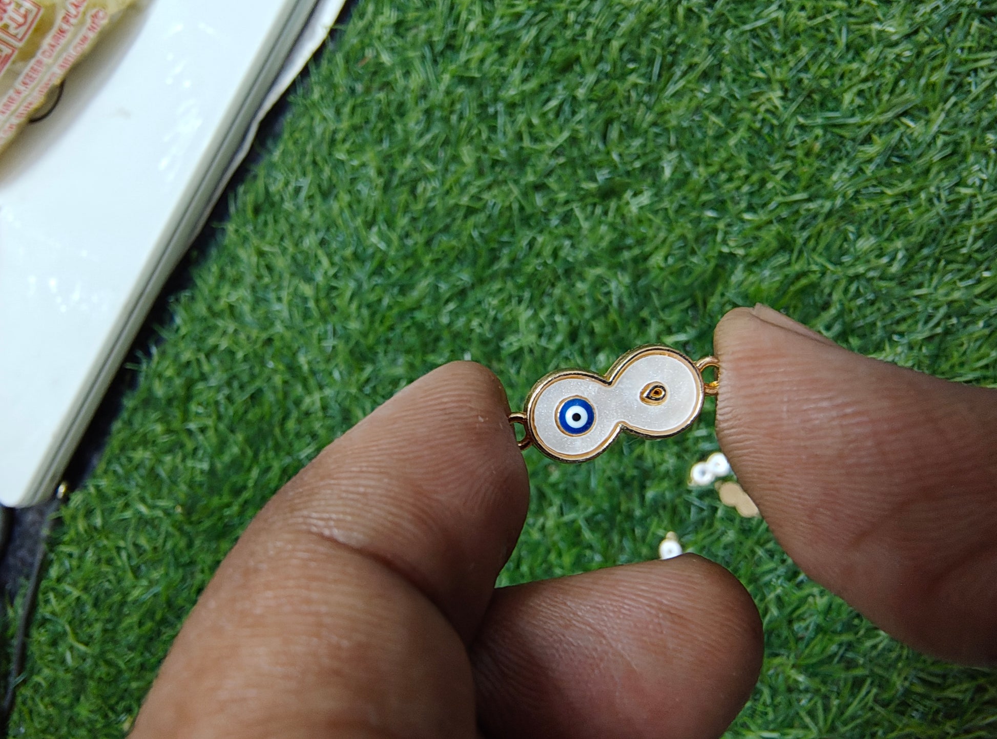 White infinity charm