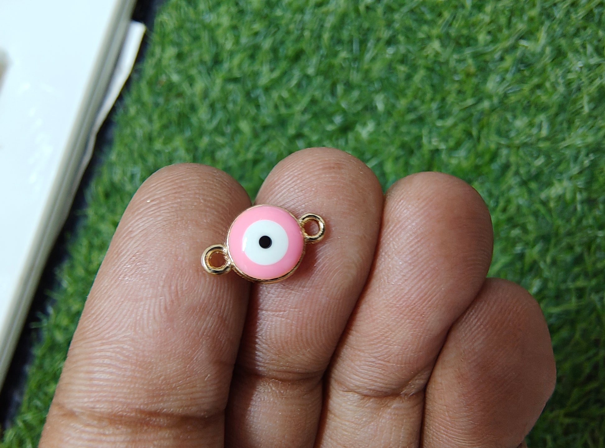 Small evil eye connector