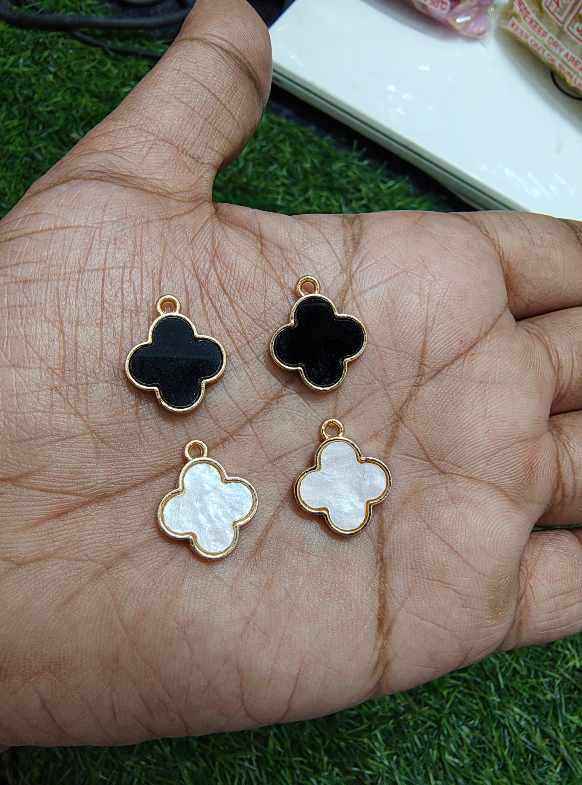 Quatrefoil charm