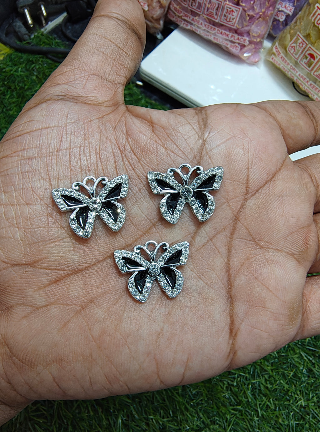 Black stone butterfly charm