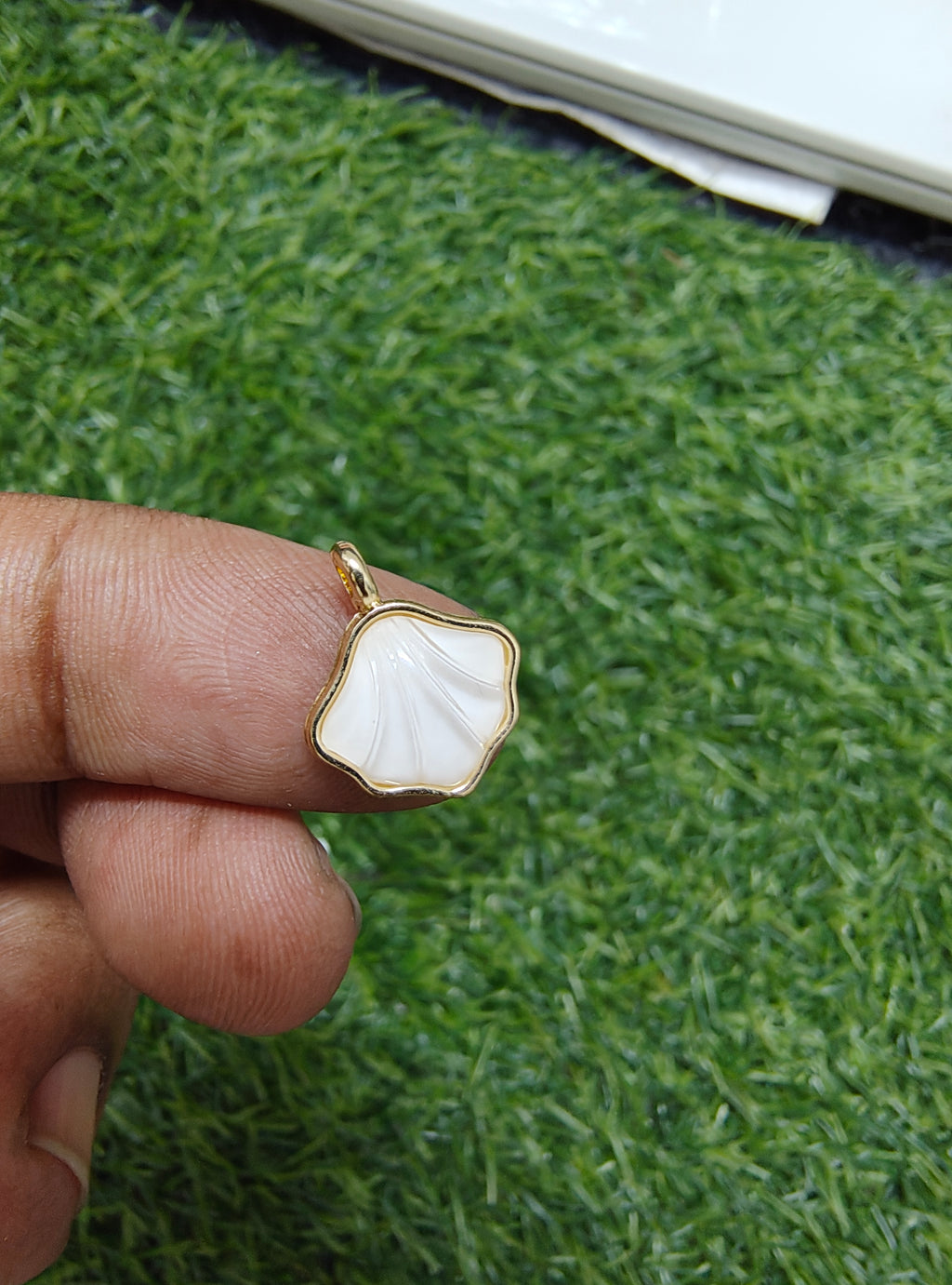 Premium quality shell charm