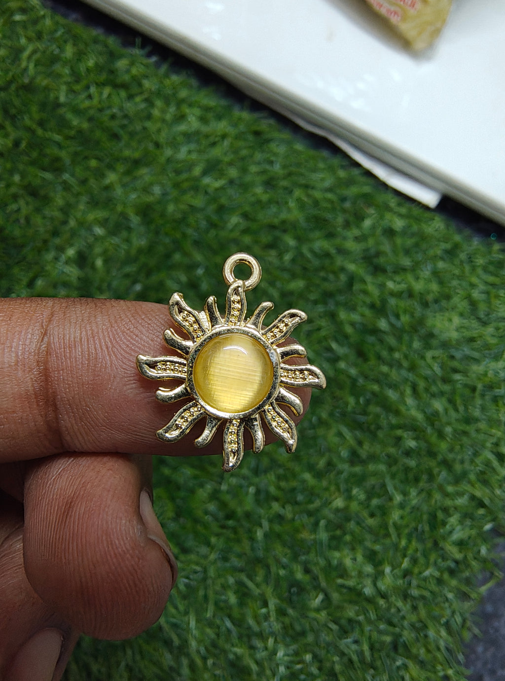 Sun stone charm