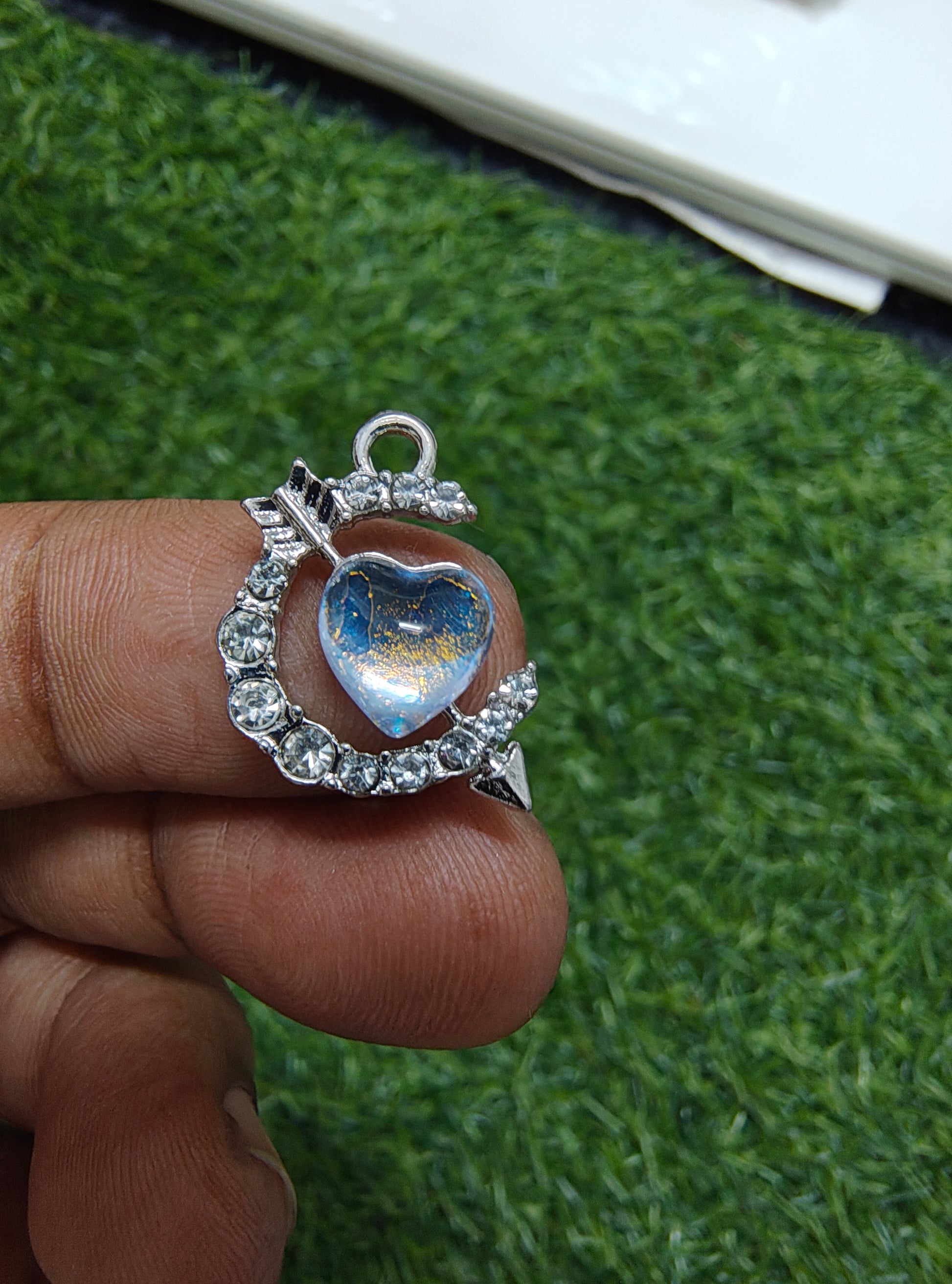Moon with inside heart stone charm