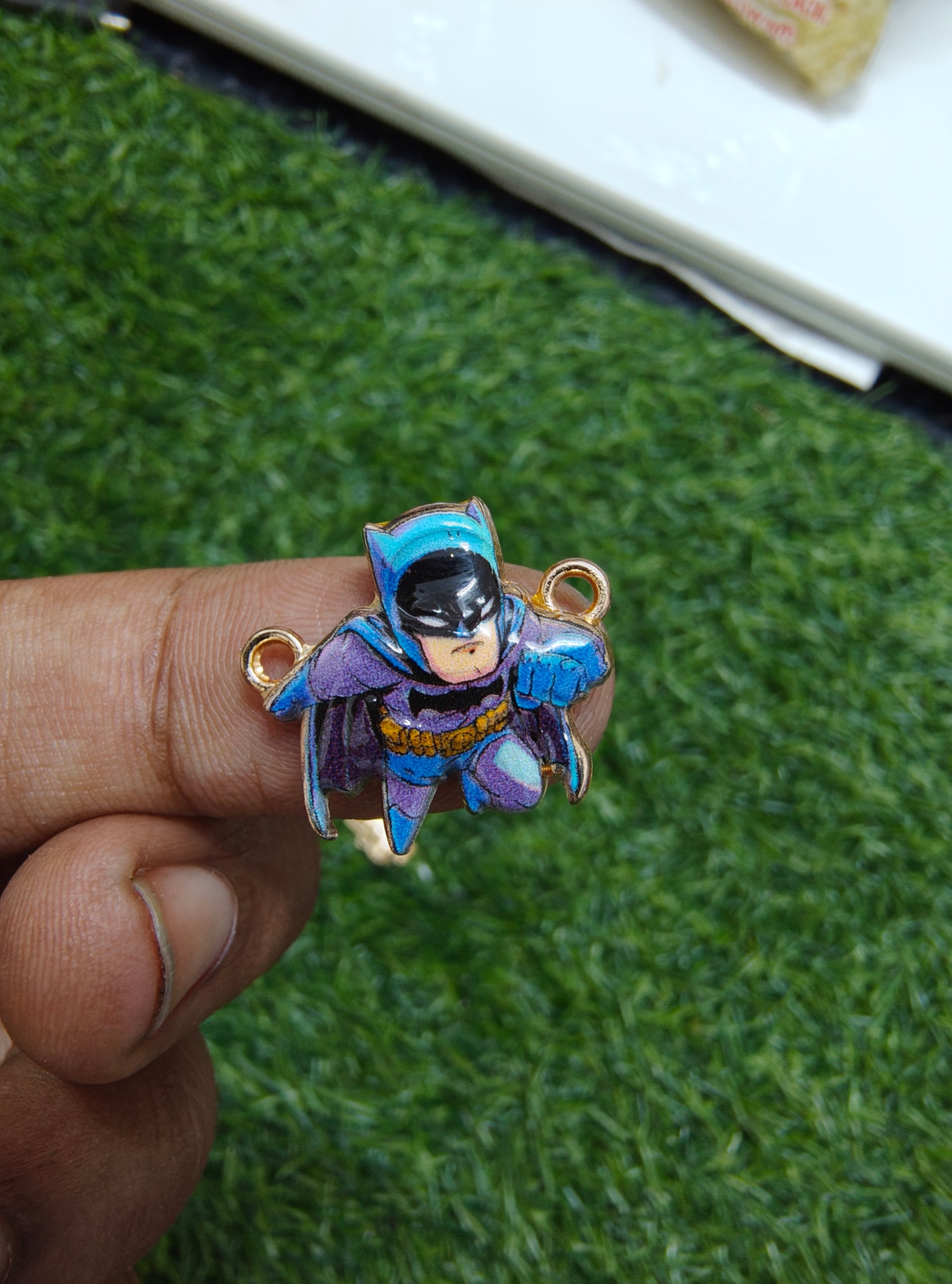 Superhero character charm