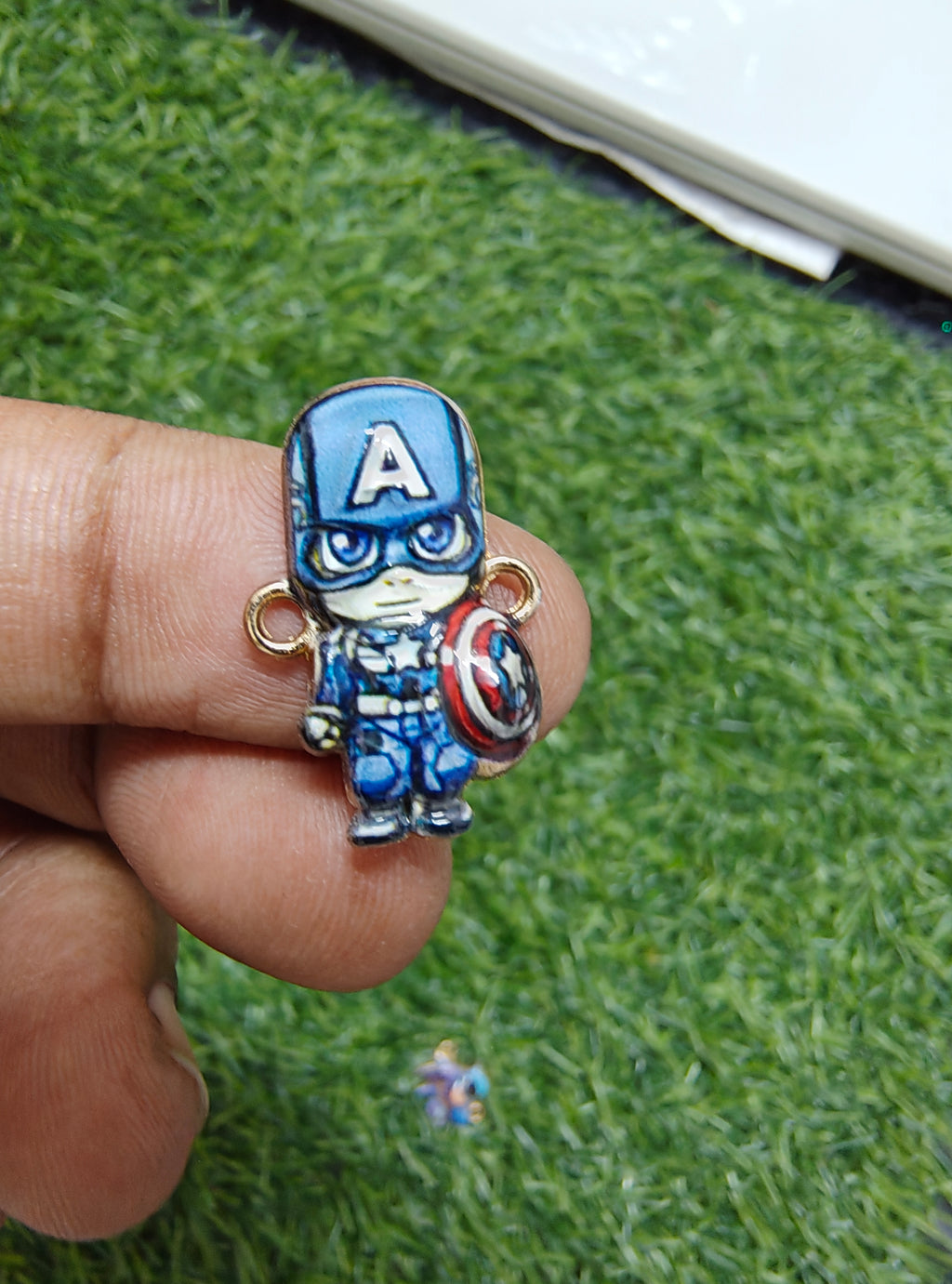 Superhero character charm