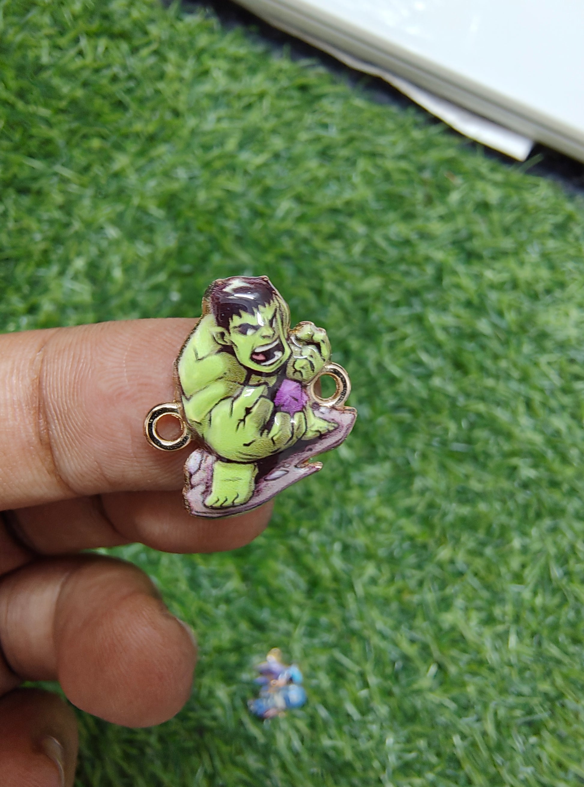 Superhero character charm