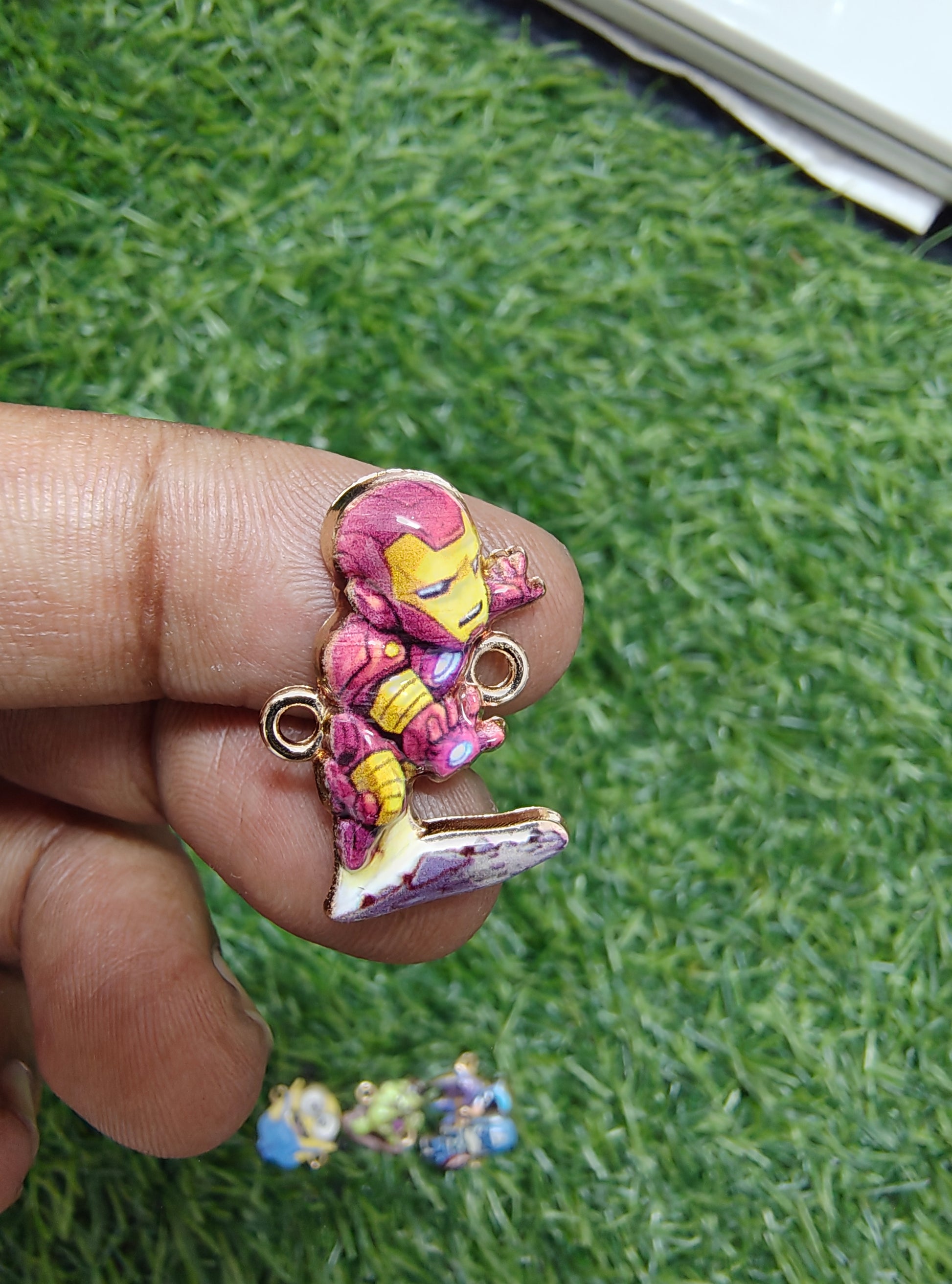 Superhero character charm