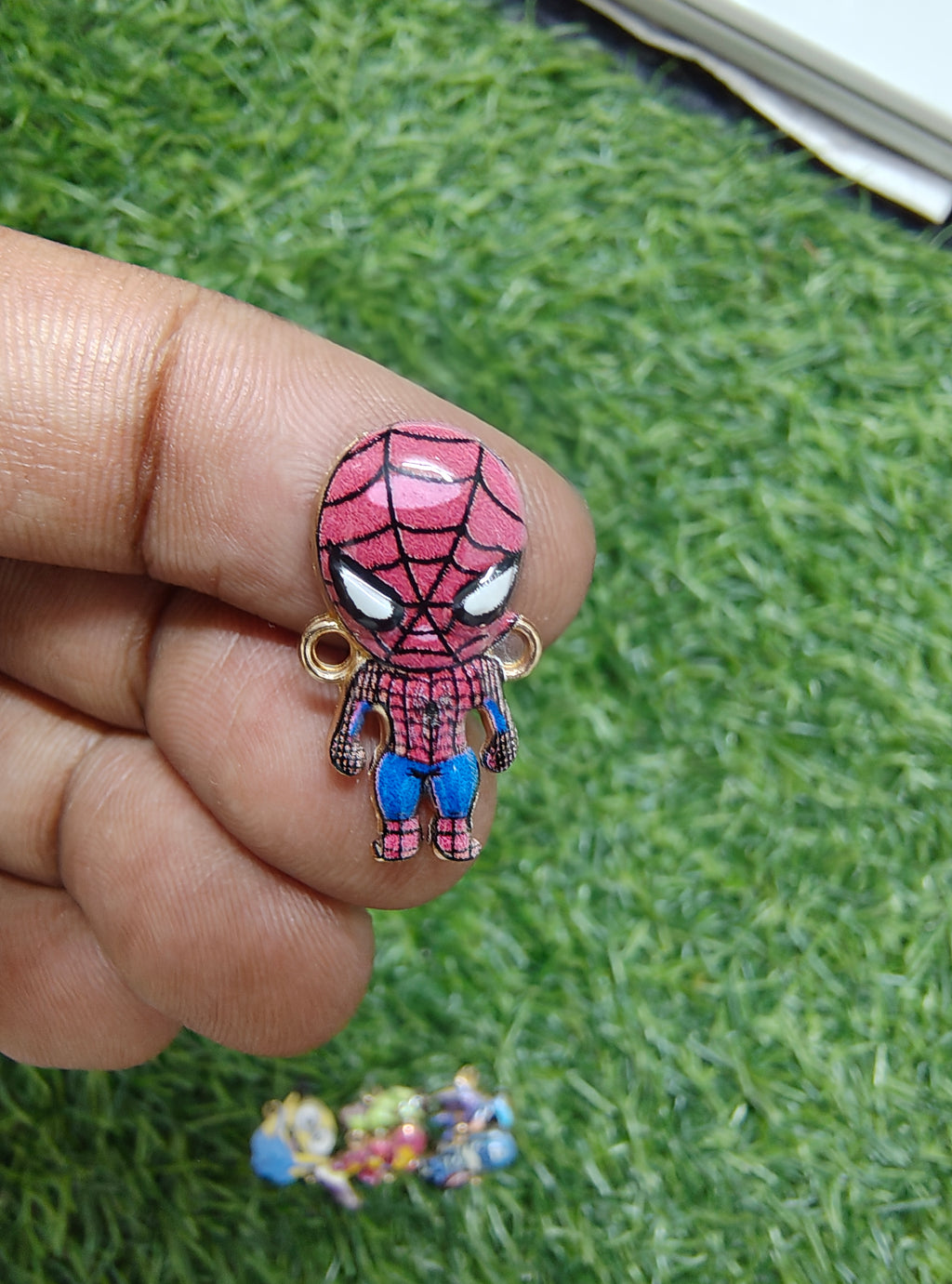 Superhero character charm