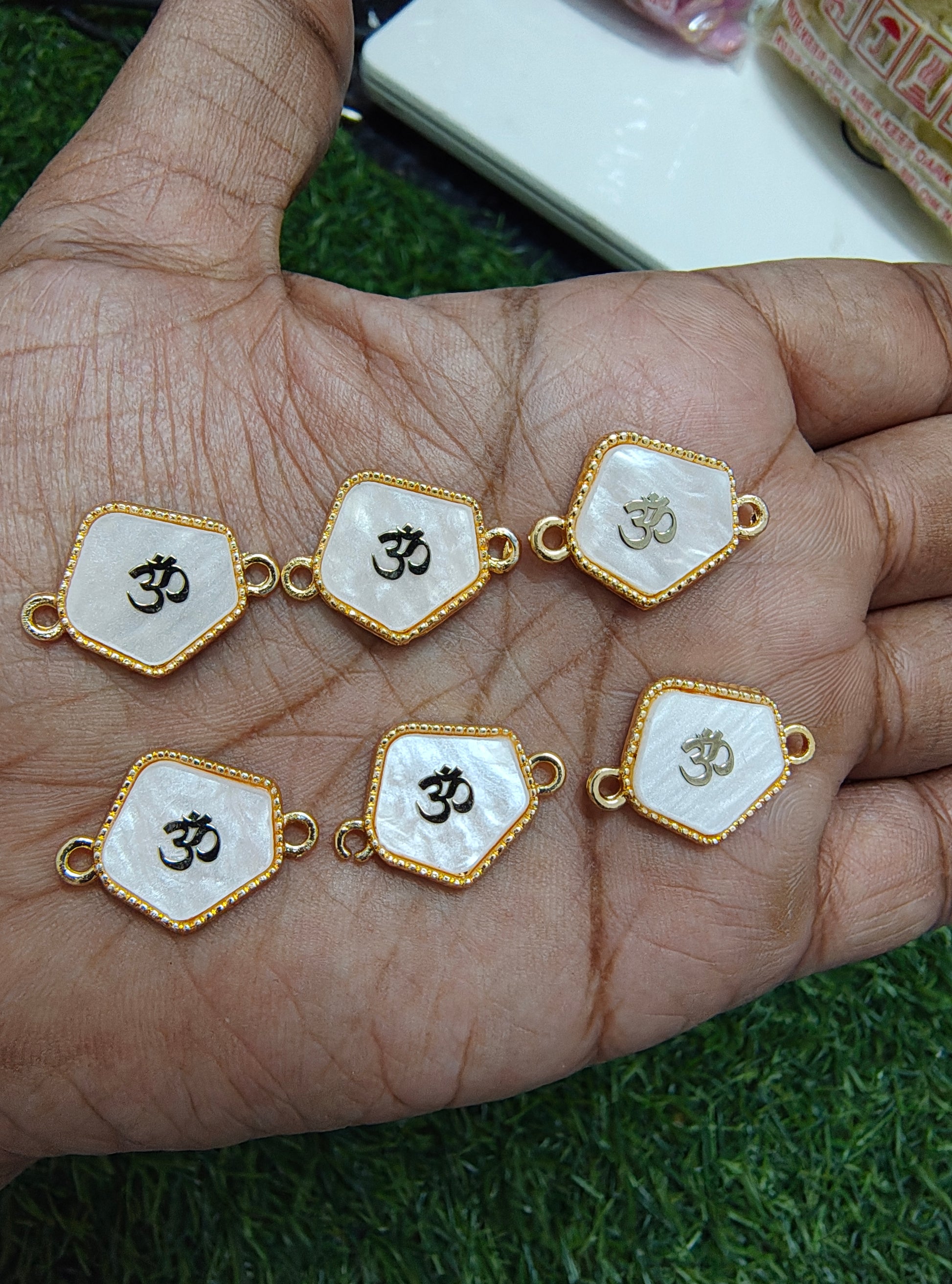 Om rakhi enamal charm