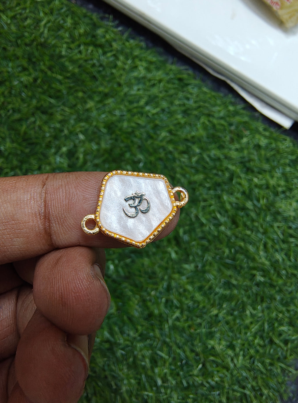 Om rakhi enamal charm