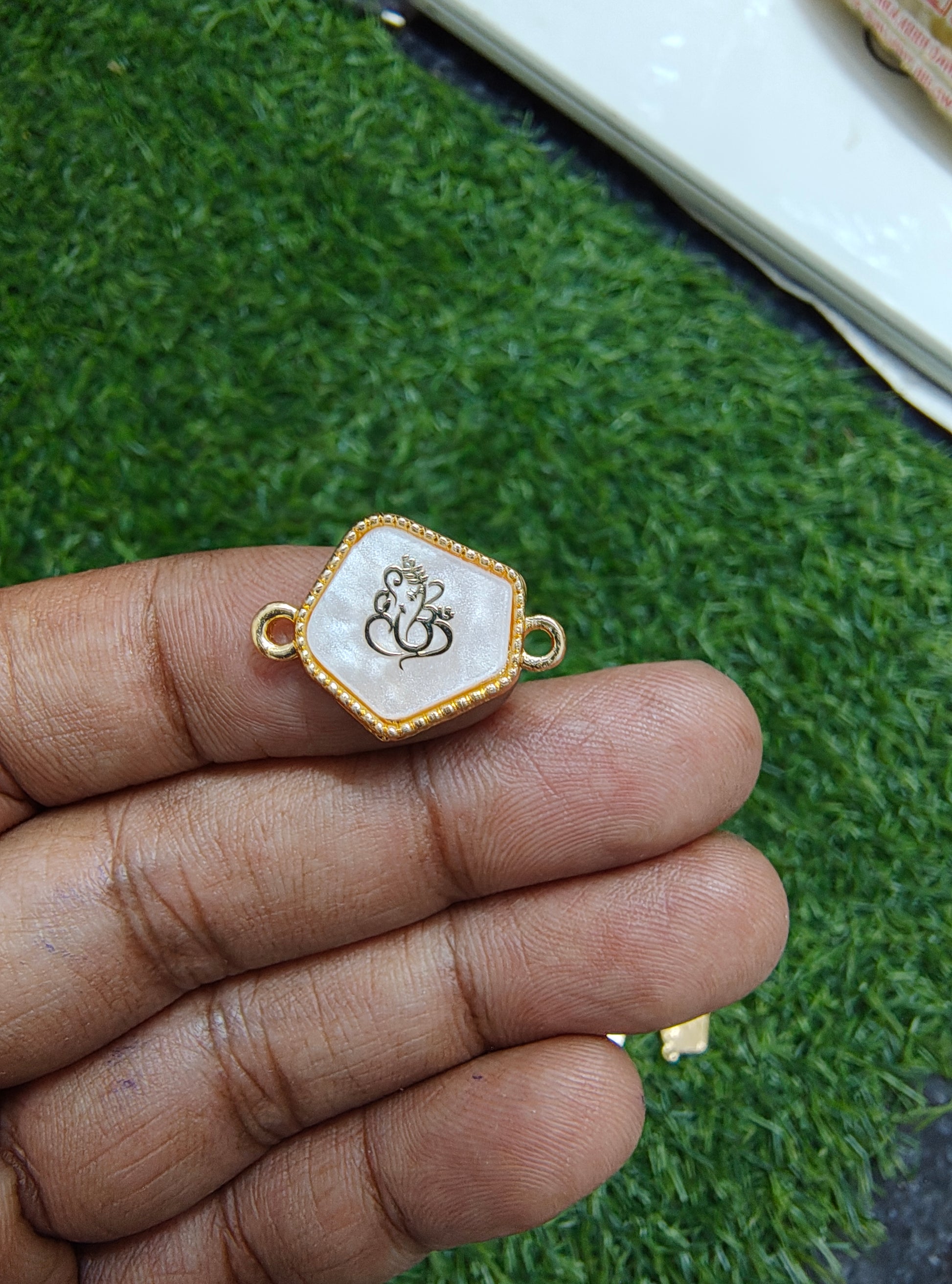 Ganesha enamal rakhi charm 2