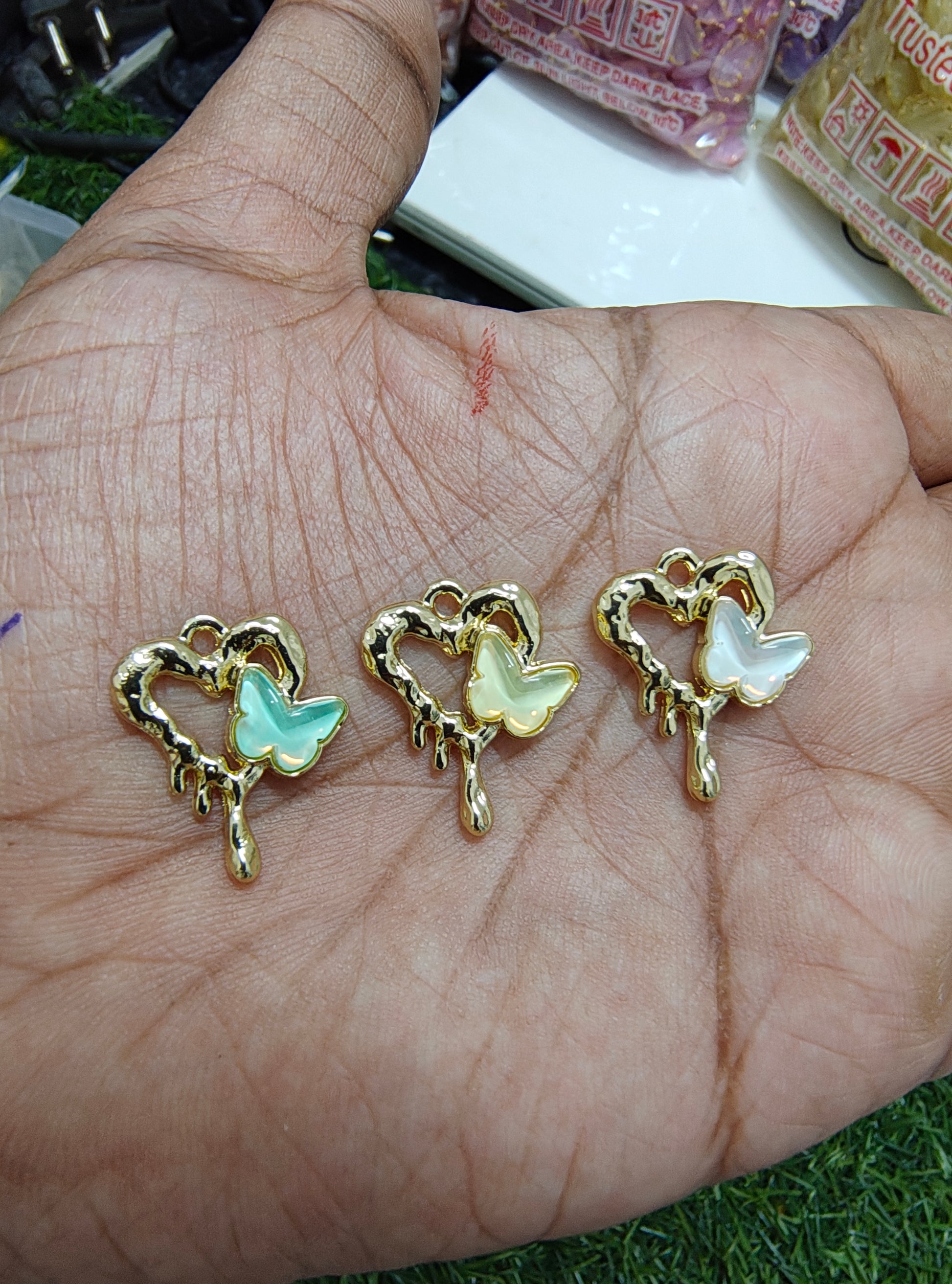 Stone butterfly with heart charm