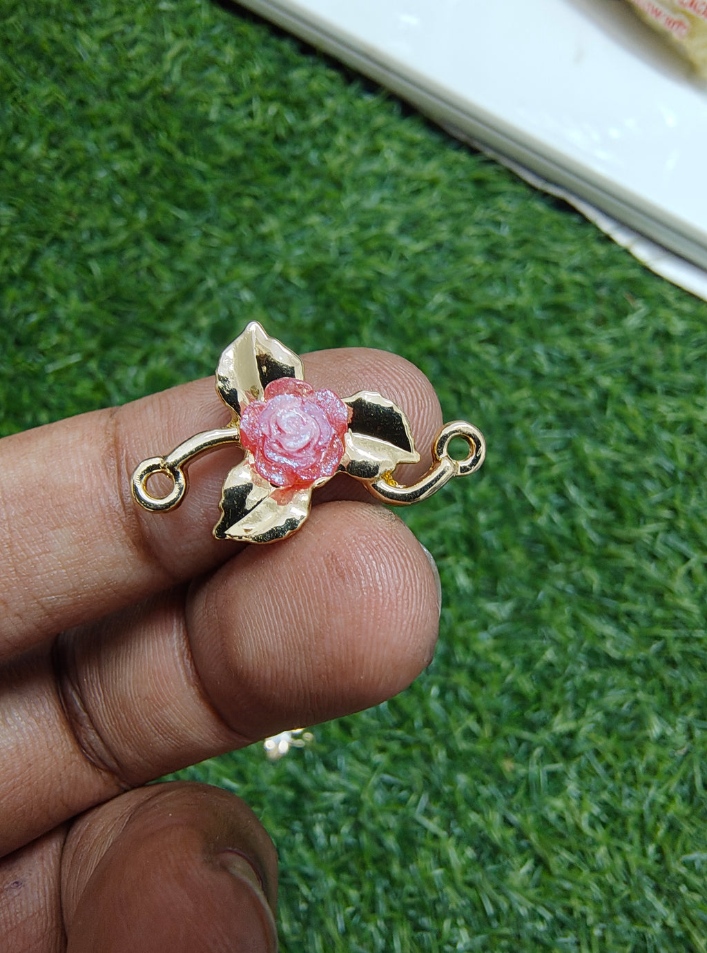 Rose in metal rakhi charm