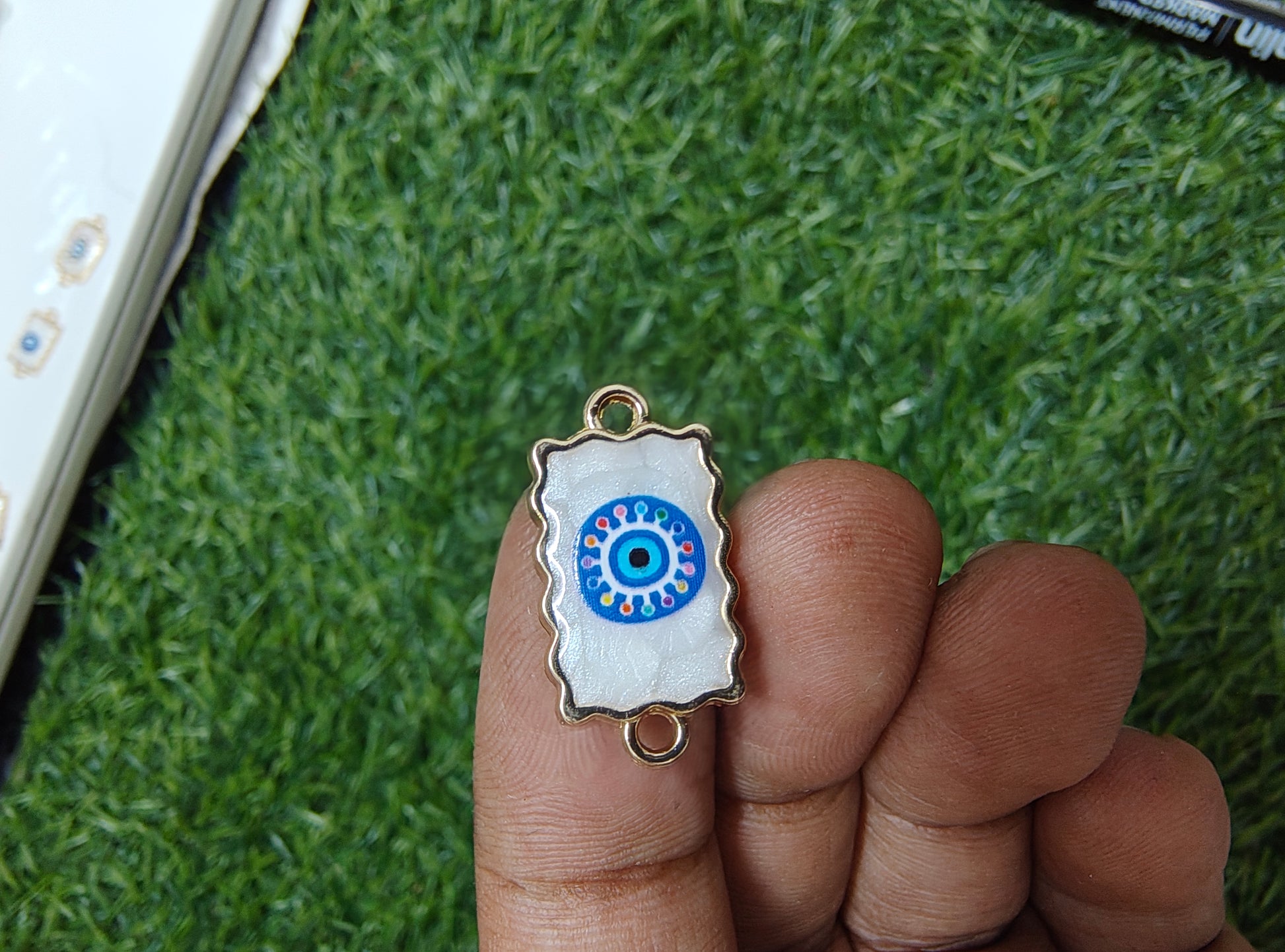 Evil eye rakhi charm( 9-12)