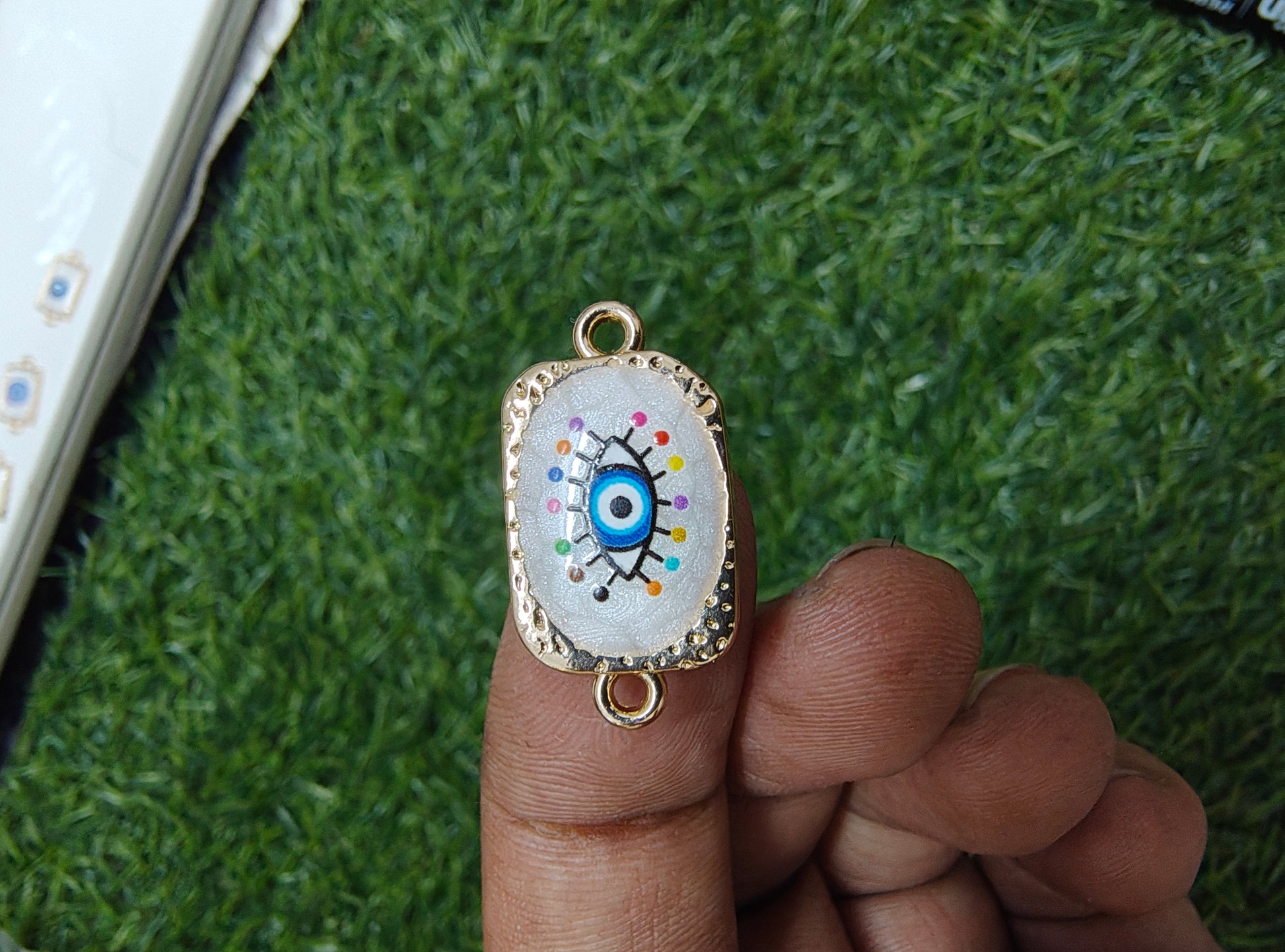 Evil eye rakhi charm( 9-12)