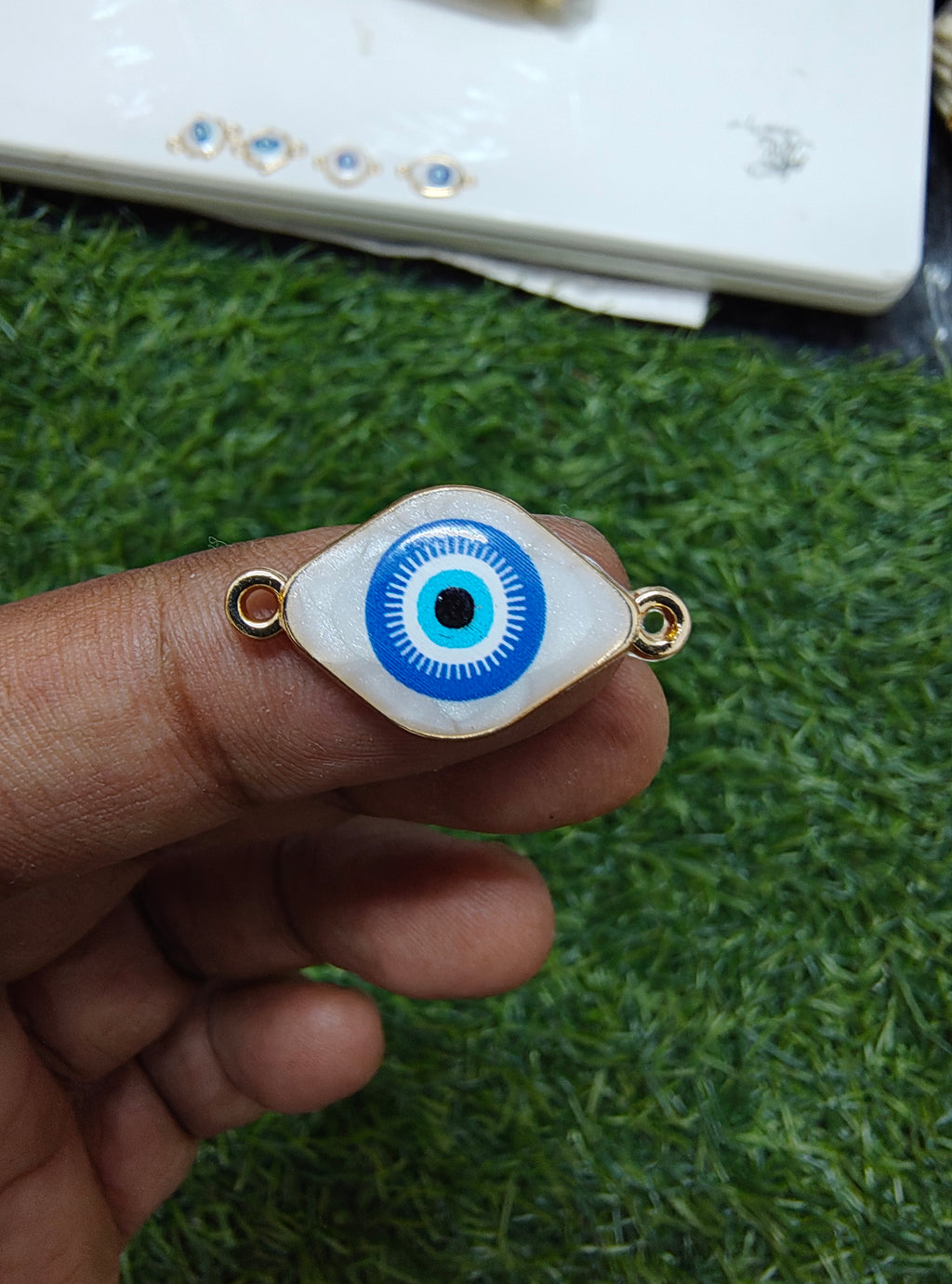 Evileye rakhi charm ( 17-21)