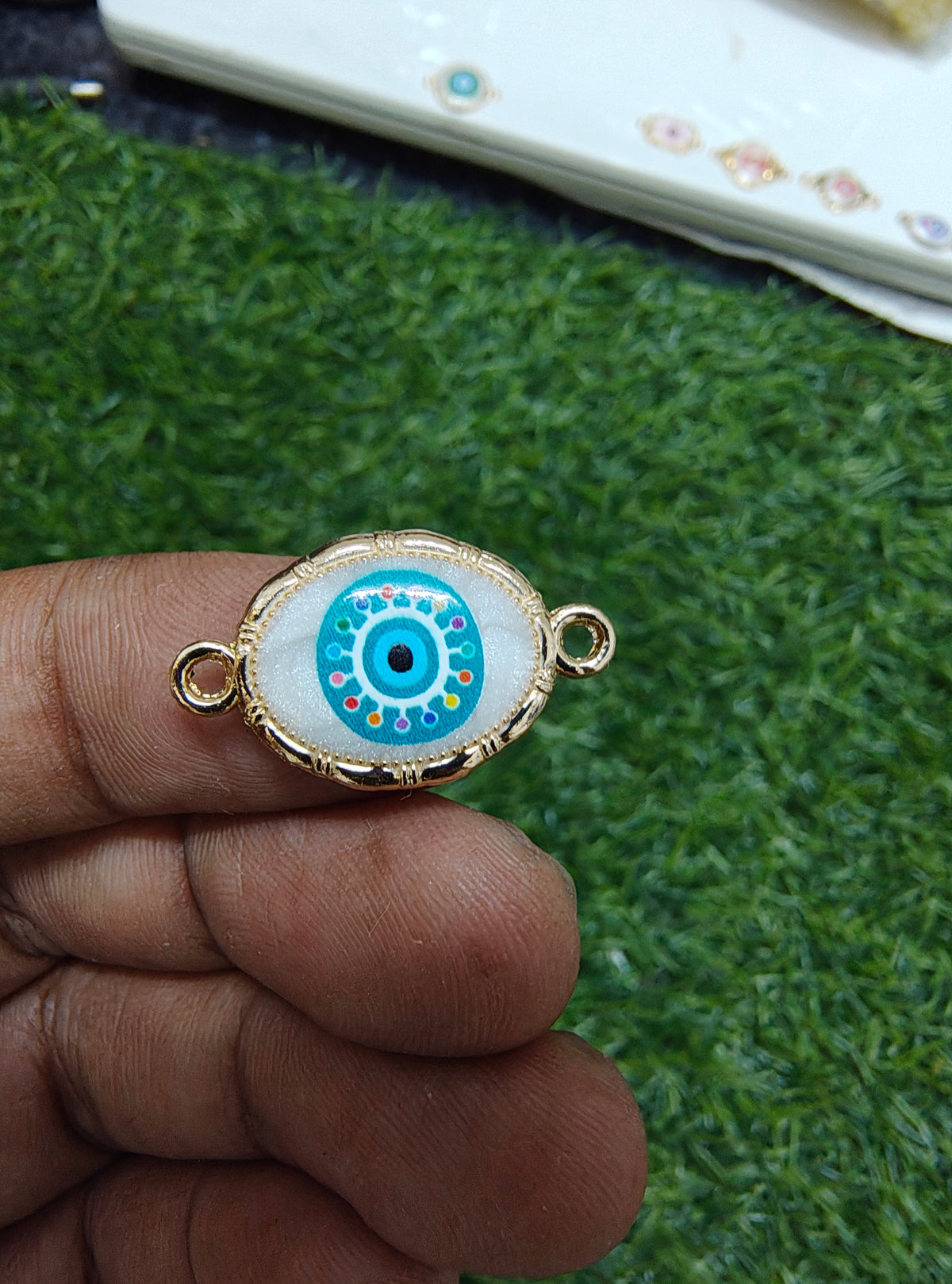 Evil eye rakhi charm( 28-33) ( RC3030 )
