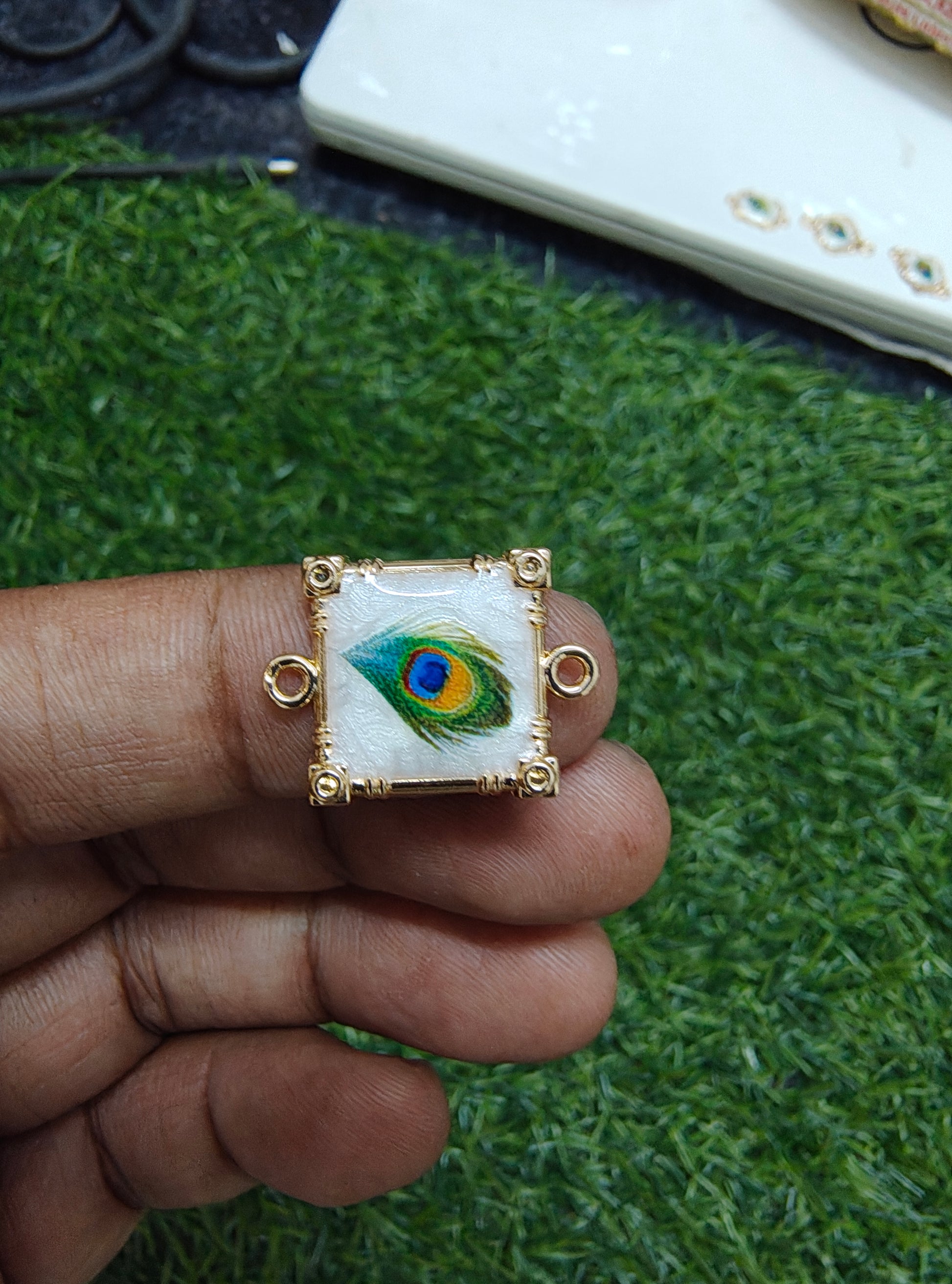 Morepankh rakhi charm (16-19)