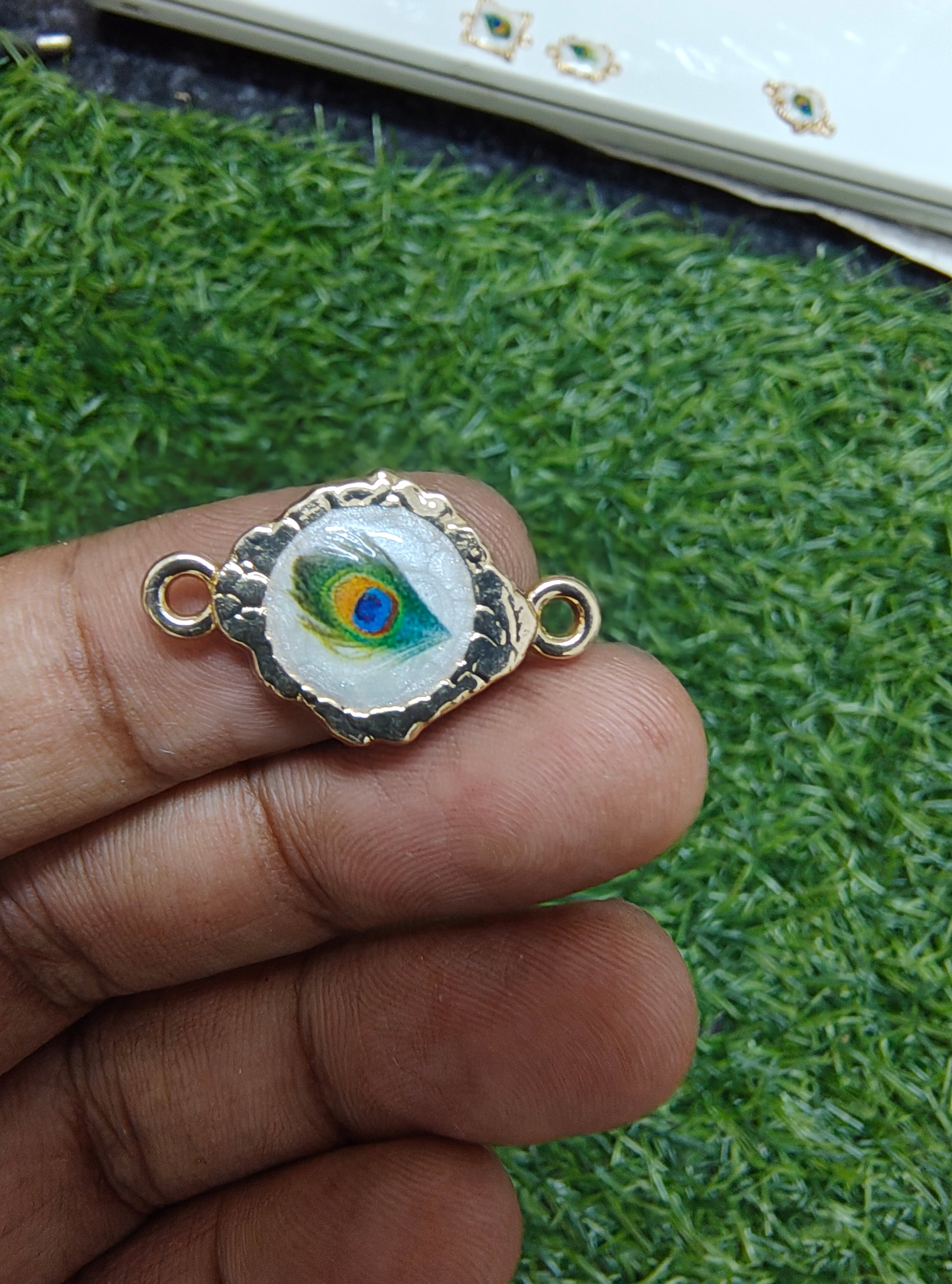 Morepankh rakhi charm (16-19)