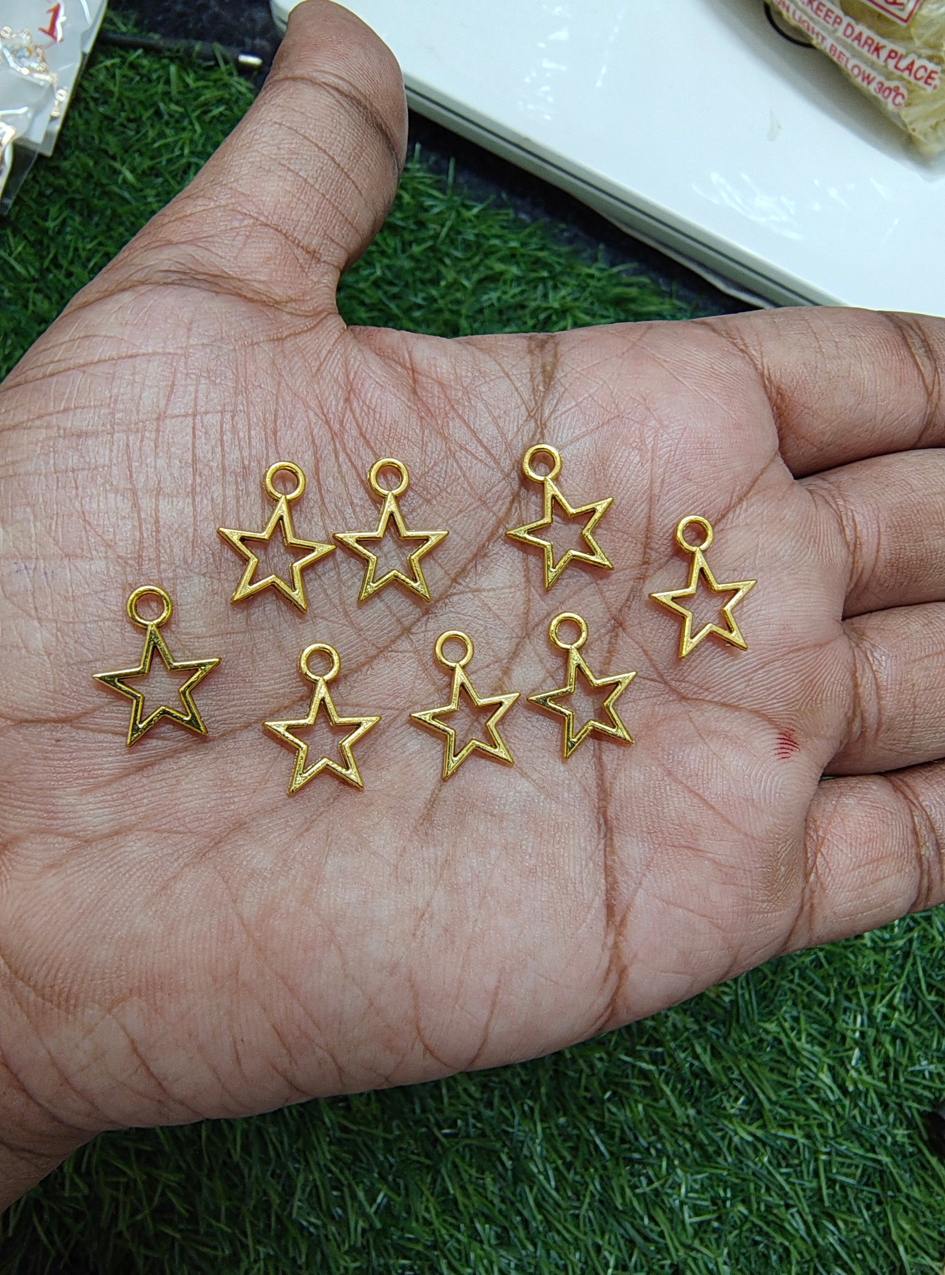 Medium metal star charm