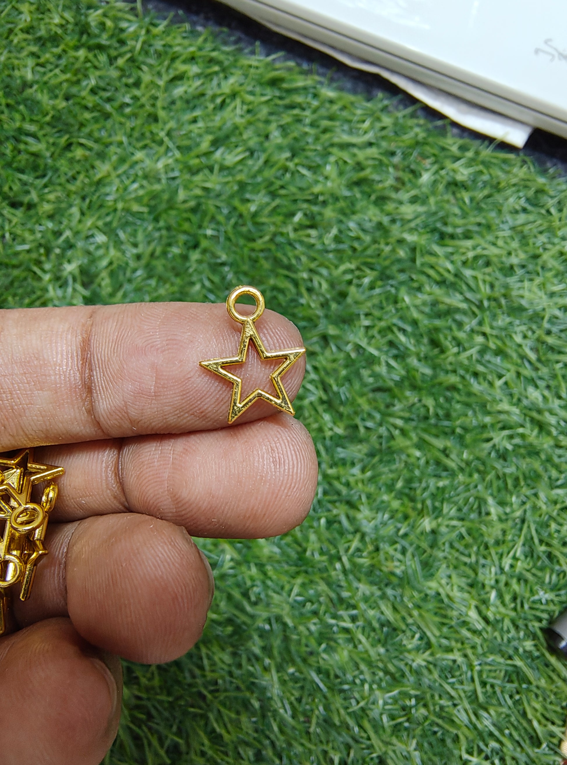Medium metal star charm