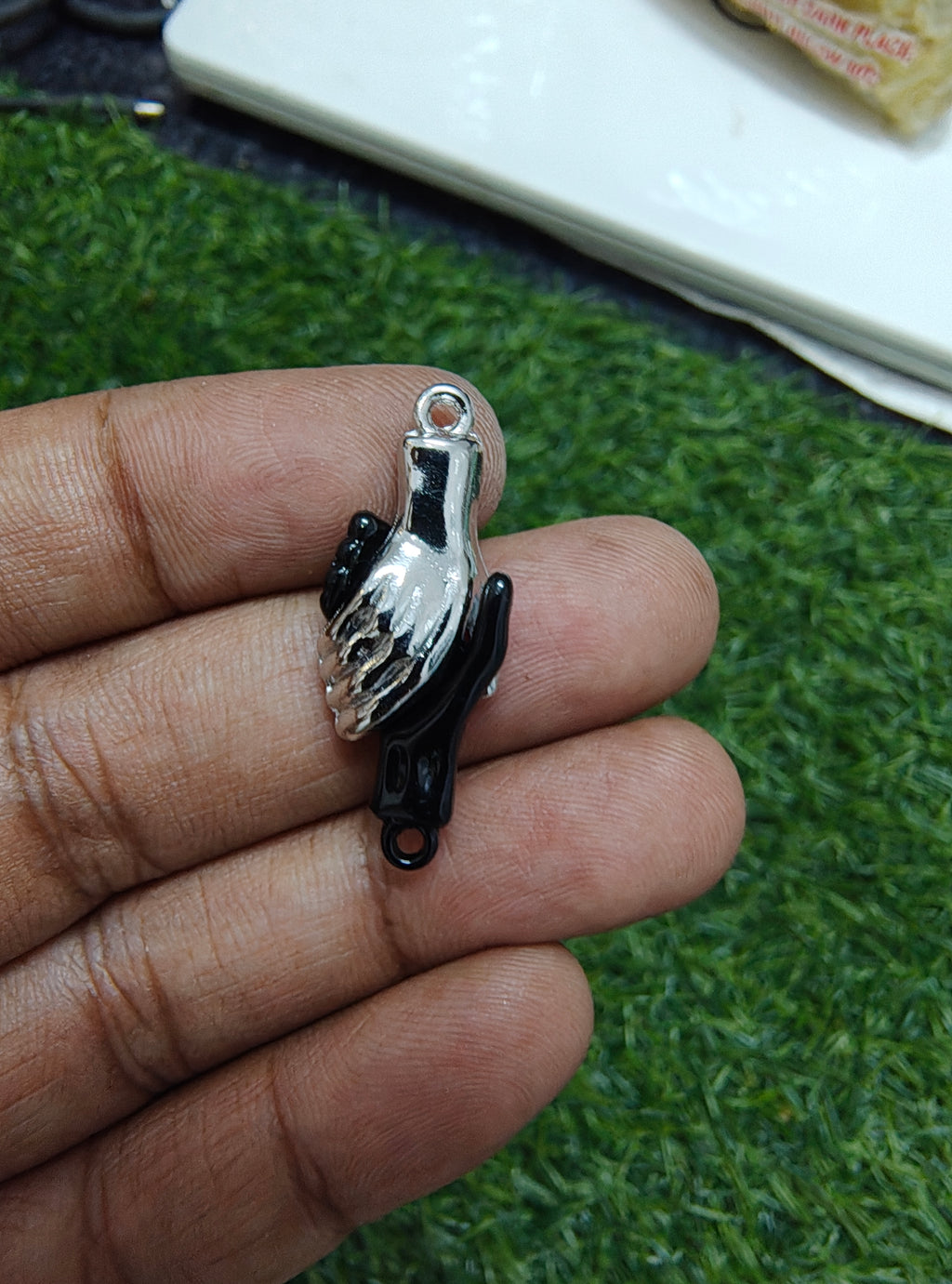 Hand magnet charm