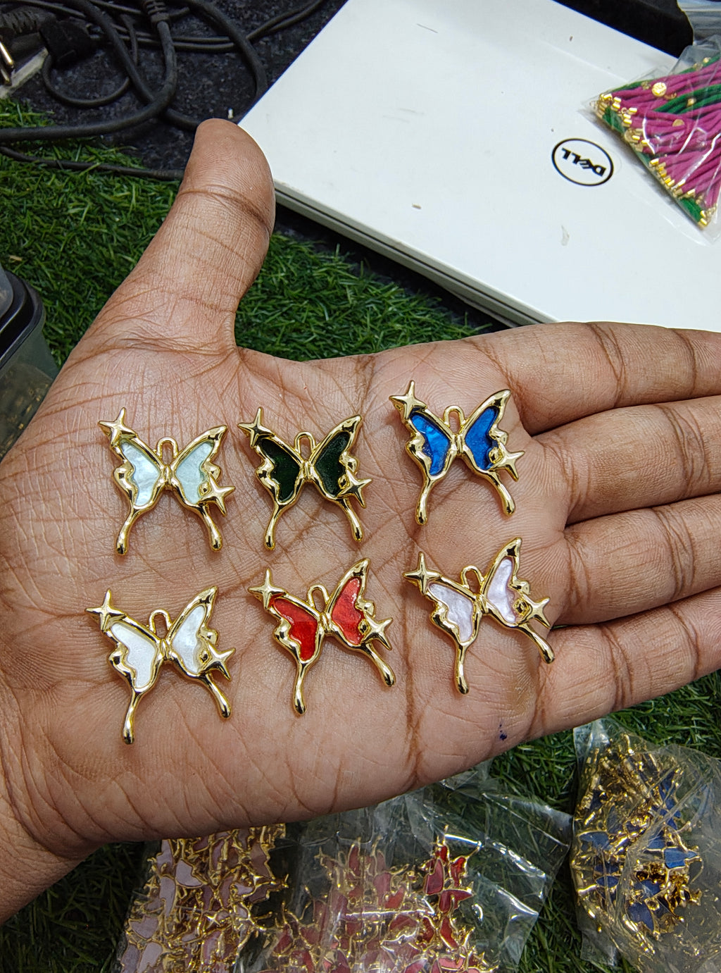 Antiturnish butterfly charm