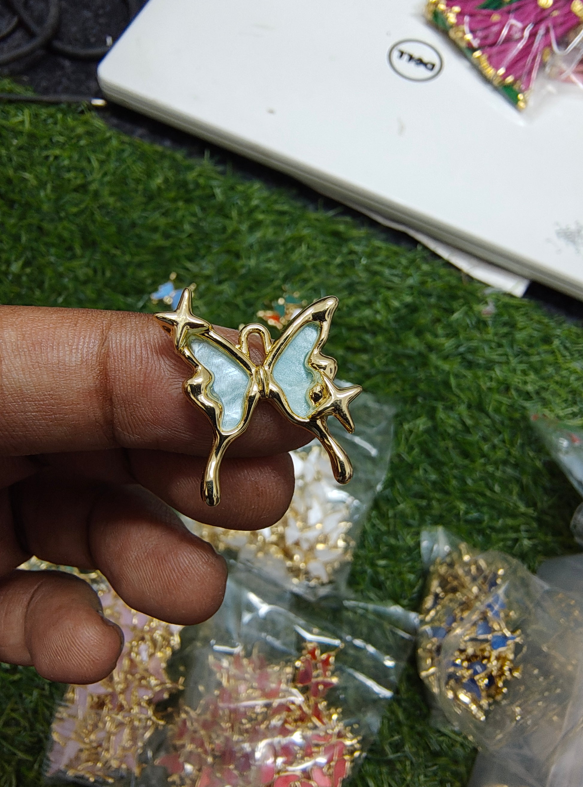 Antiturnish butterfly charm