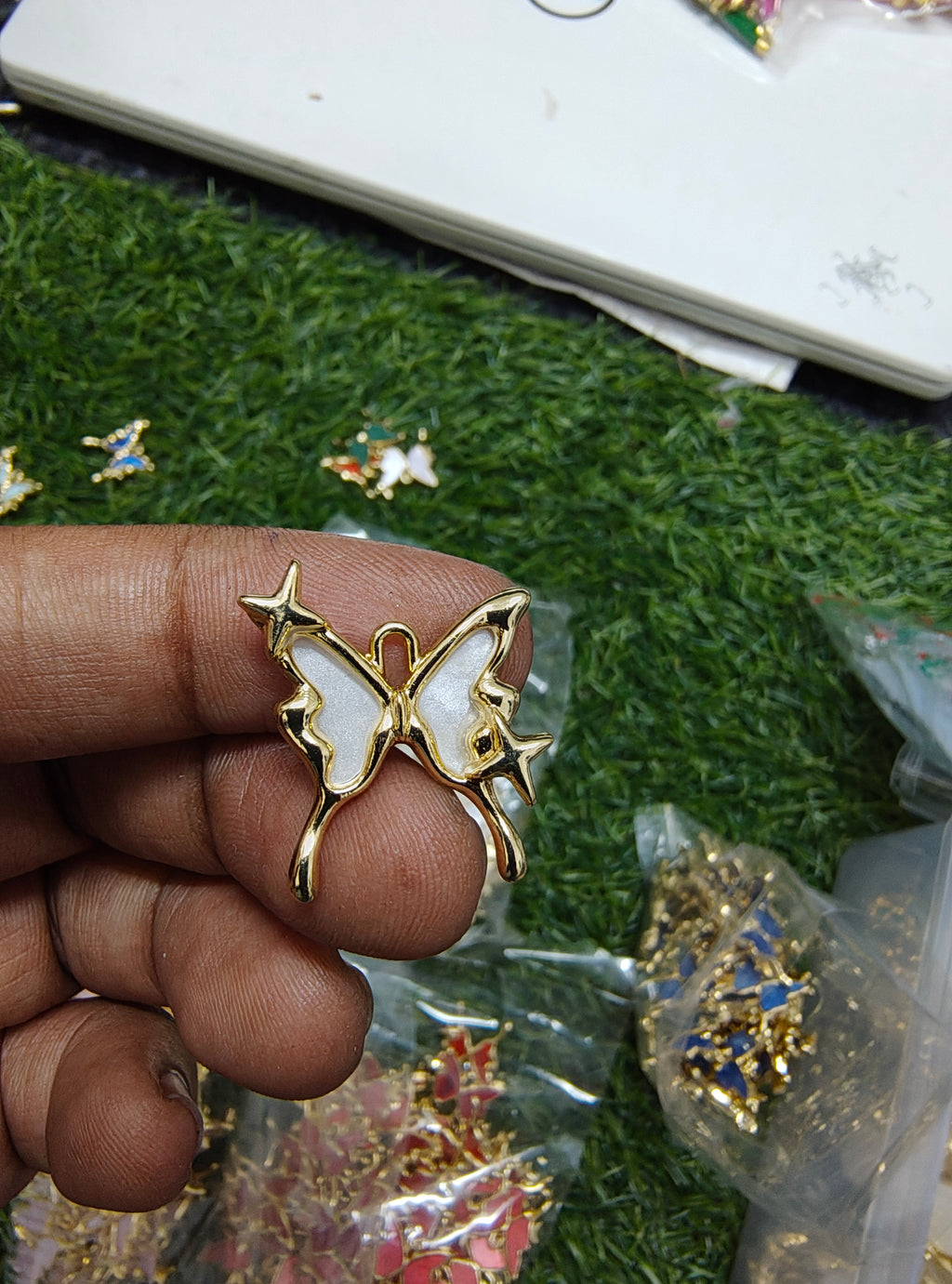 Antiturnish butterfly charm