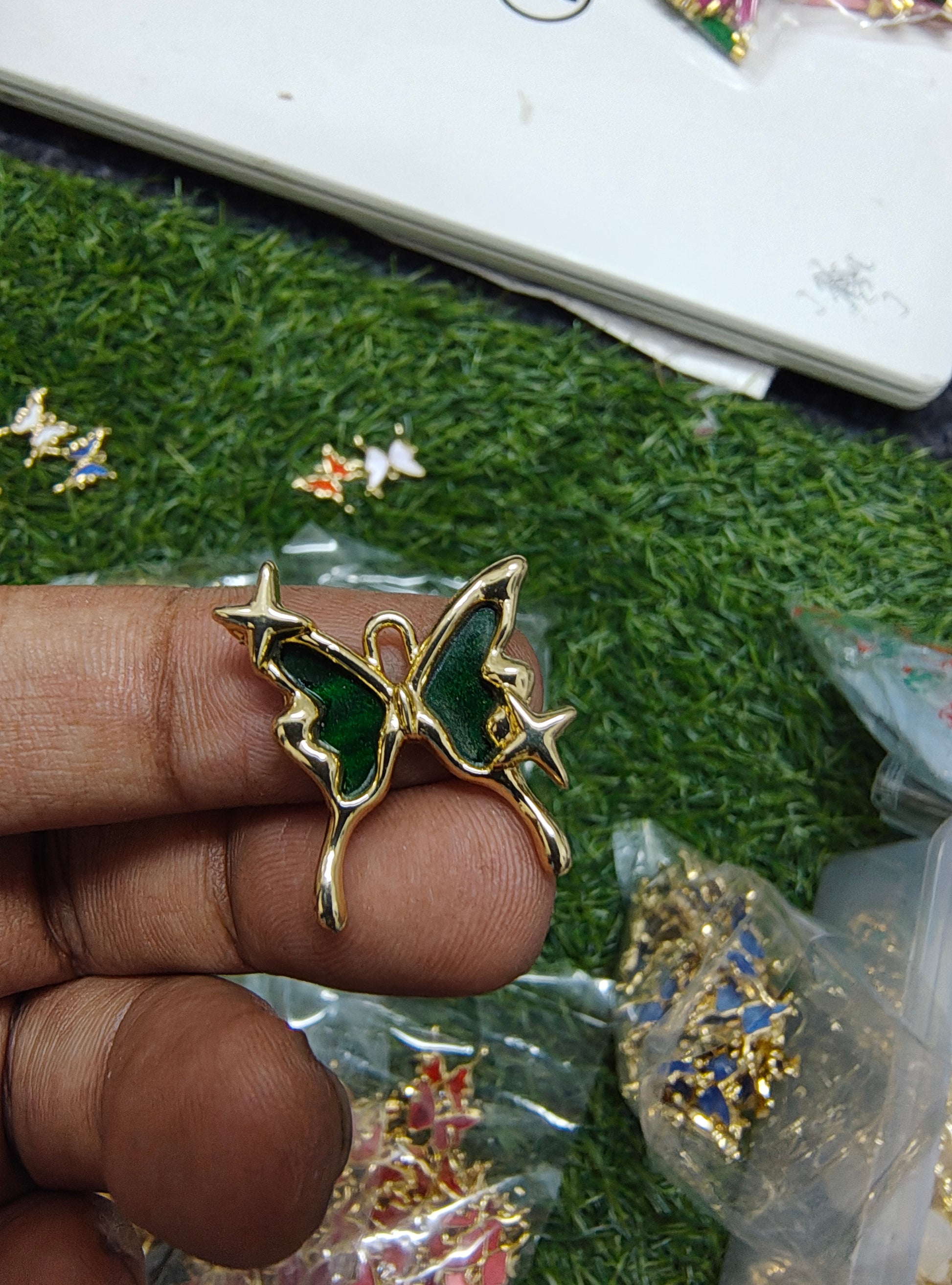 Antiturnish butterfly charm