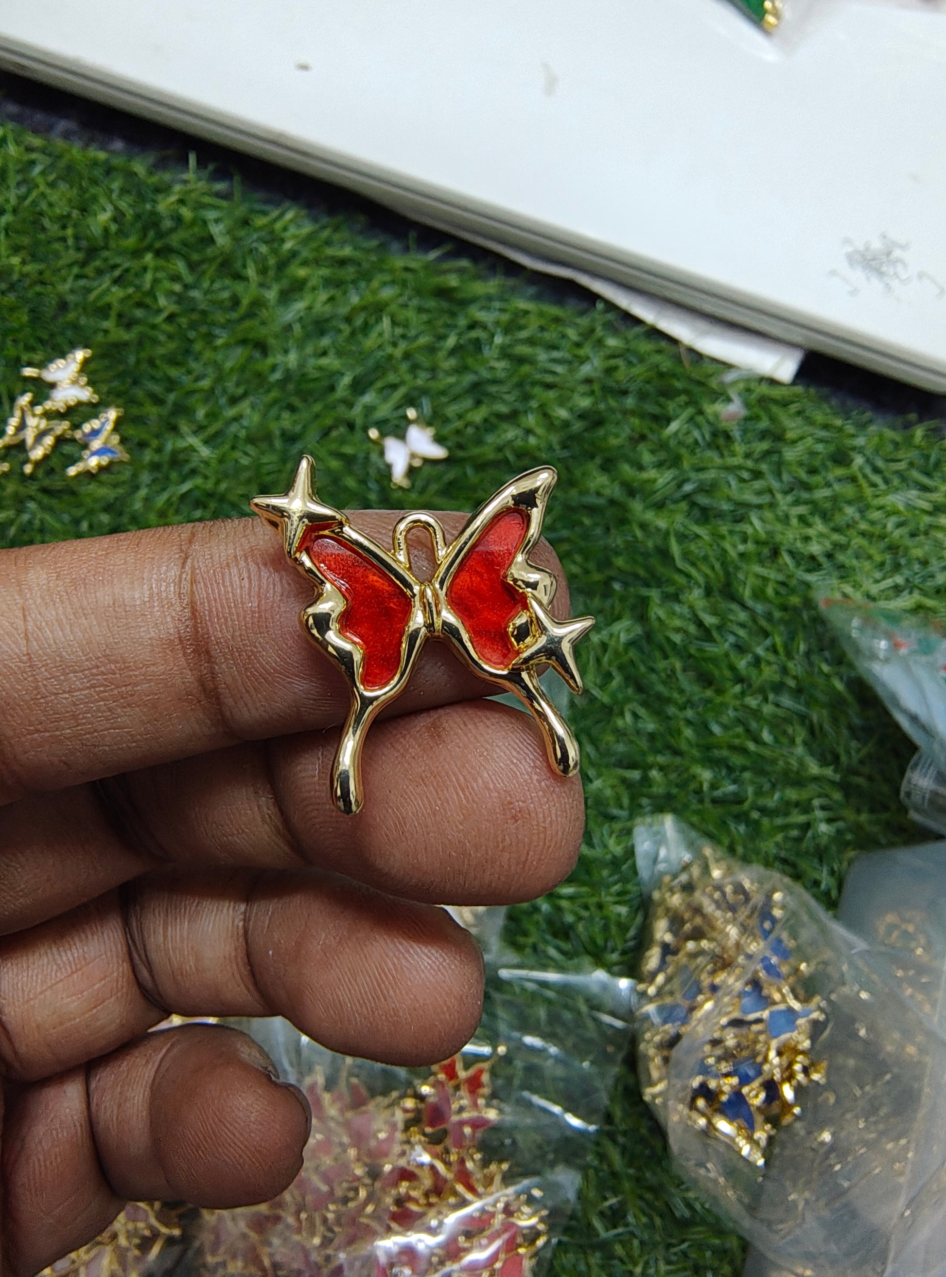 Antiturnish butterfly charm