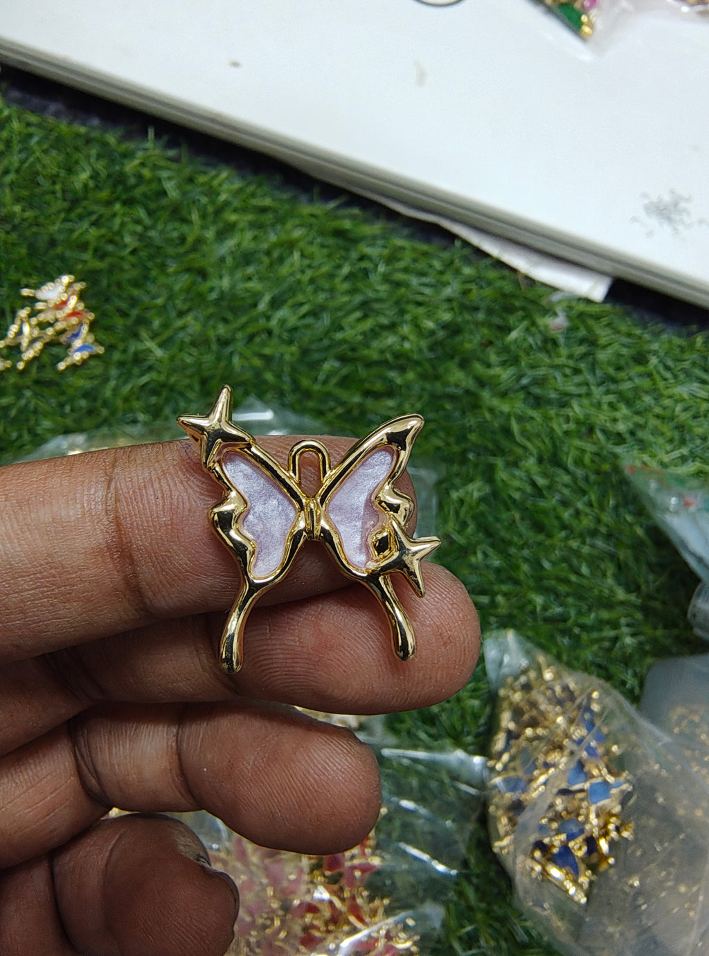 Antiturnish butterfly charm