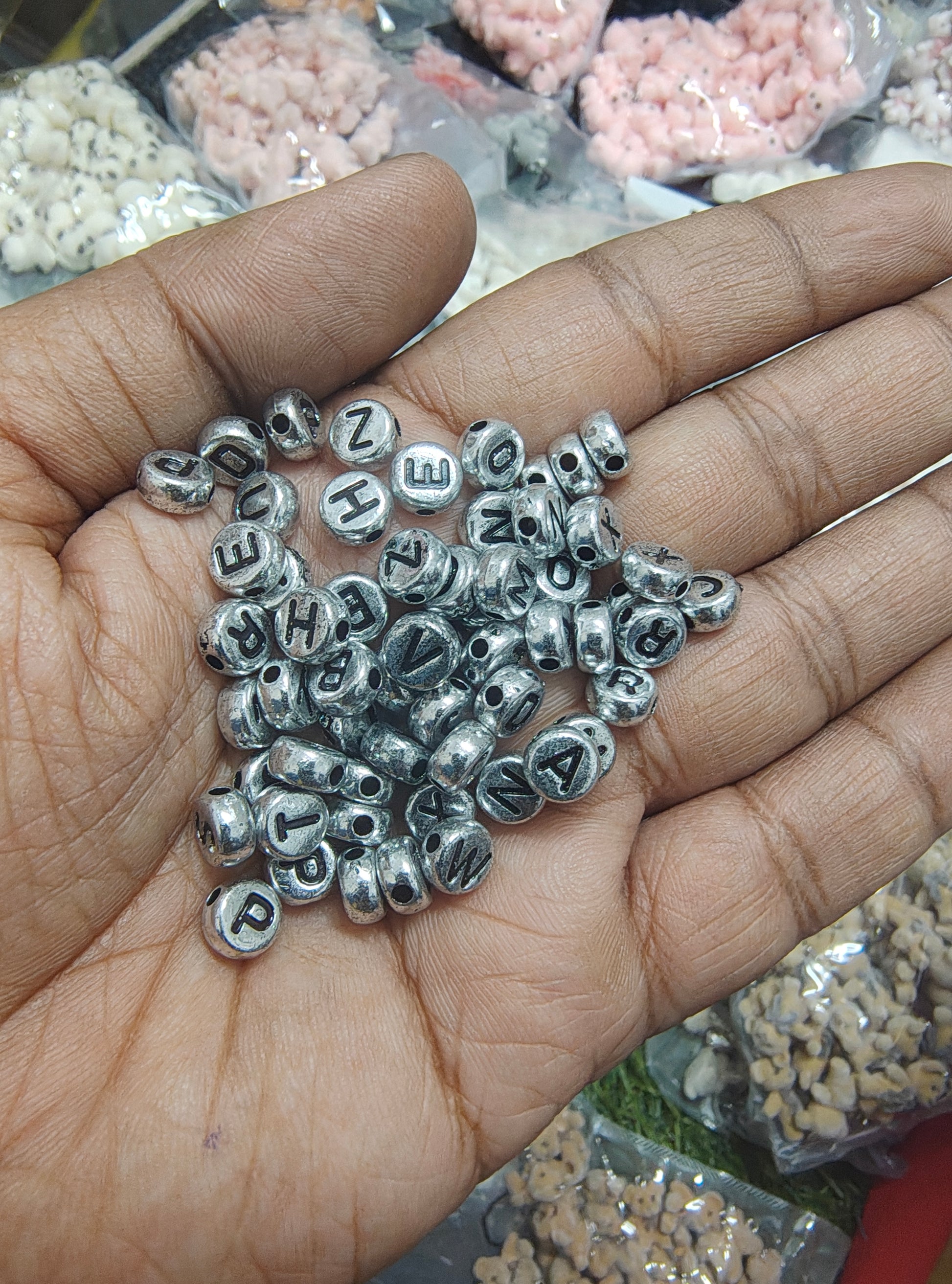 Silver round alphabet beads