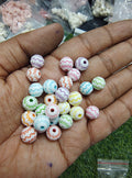 Design on round acrylic beads (AB2007)