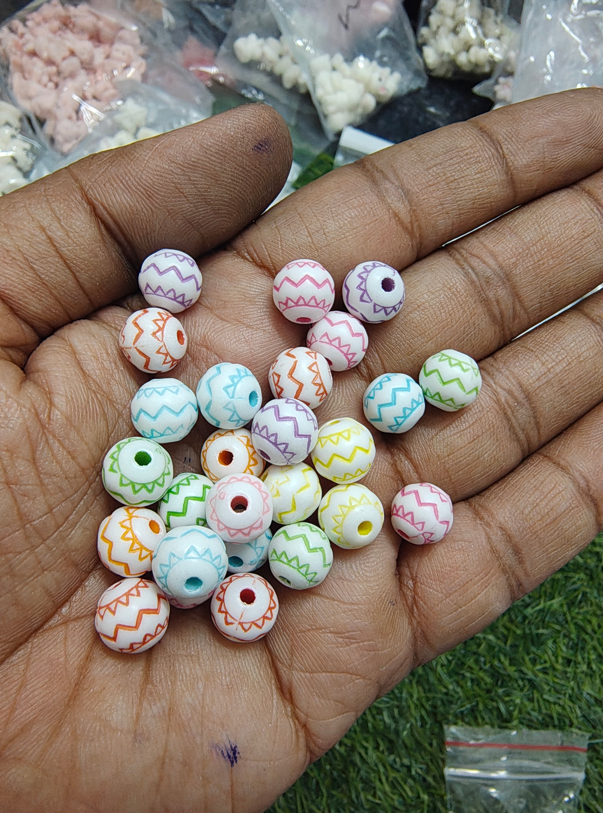 Design on round acrylic beads (AB2007)