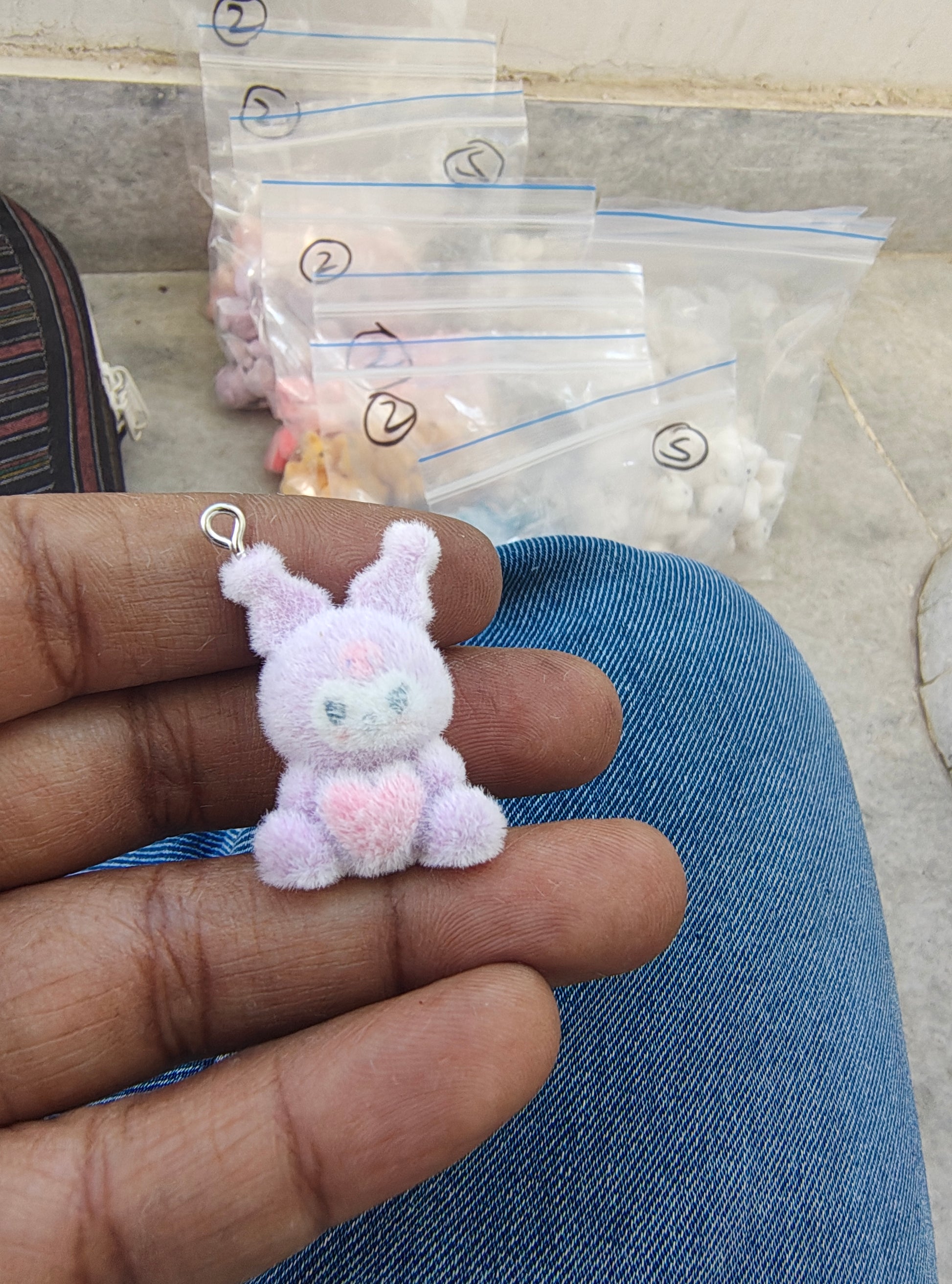 Purple snitch fur charm