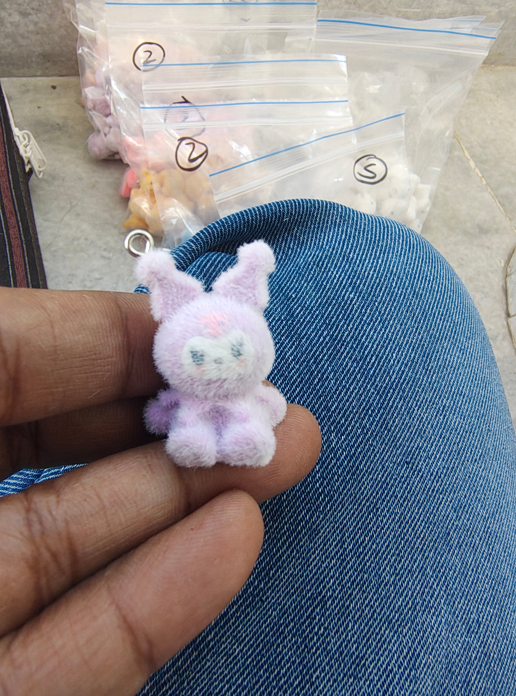 Purple snitch fur charm