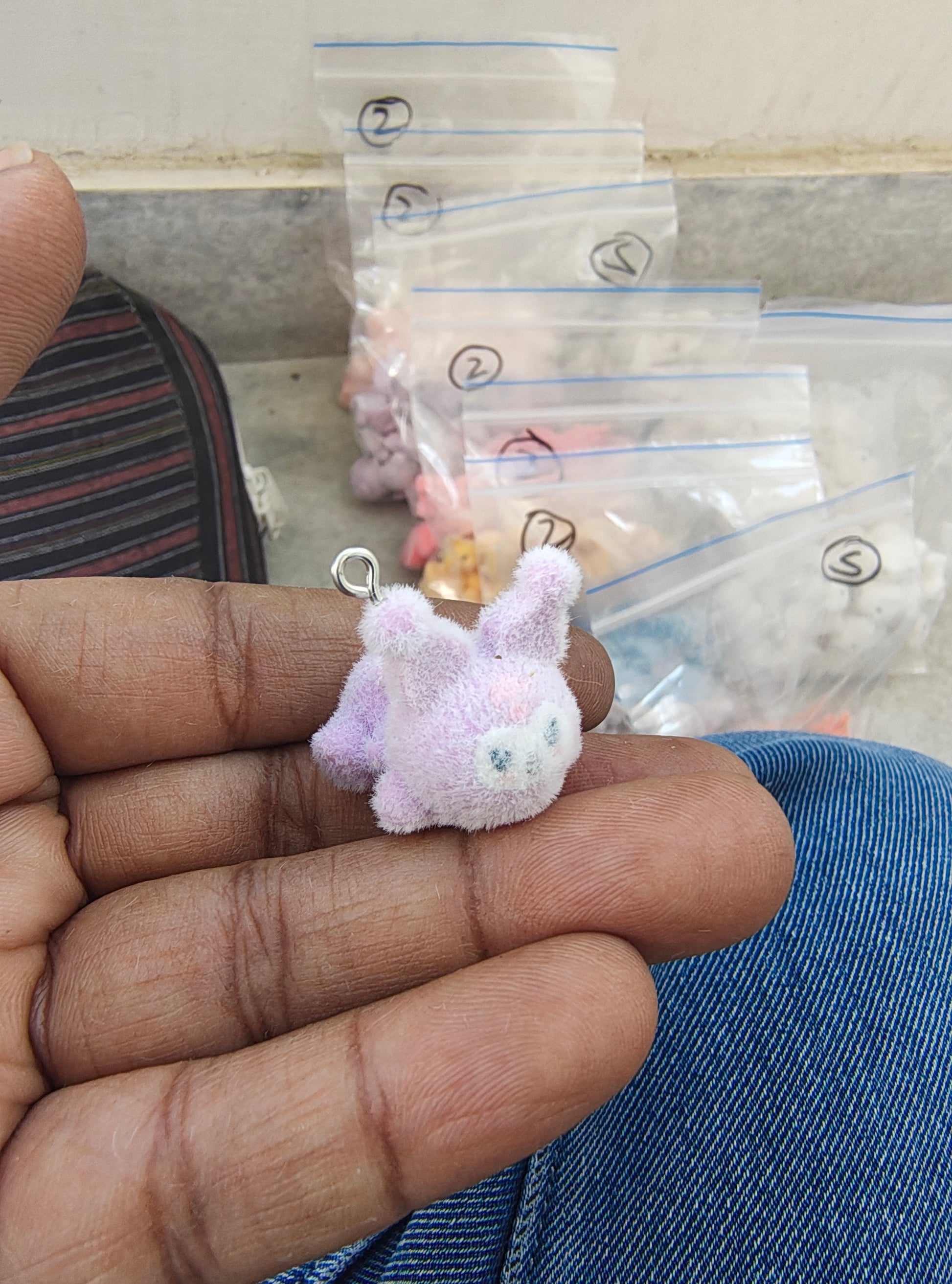 Purple snitch fur charm