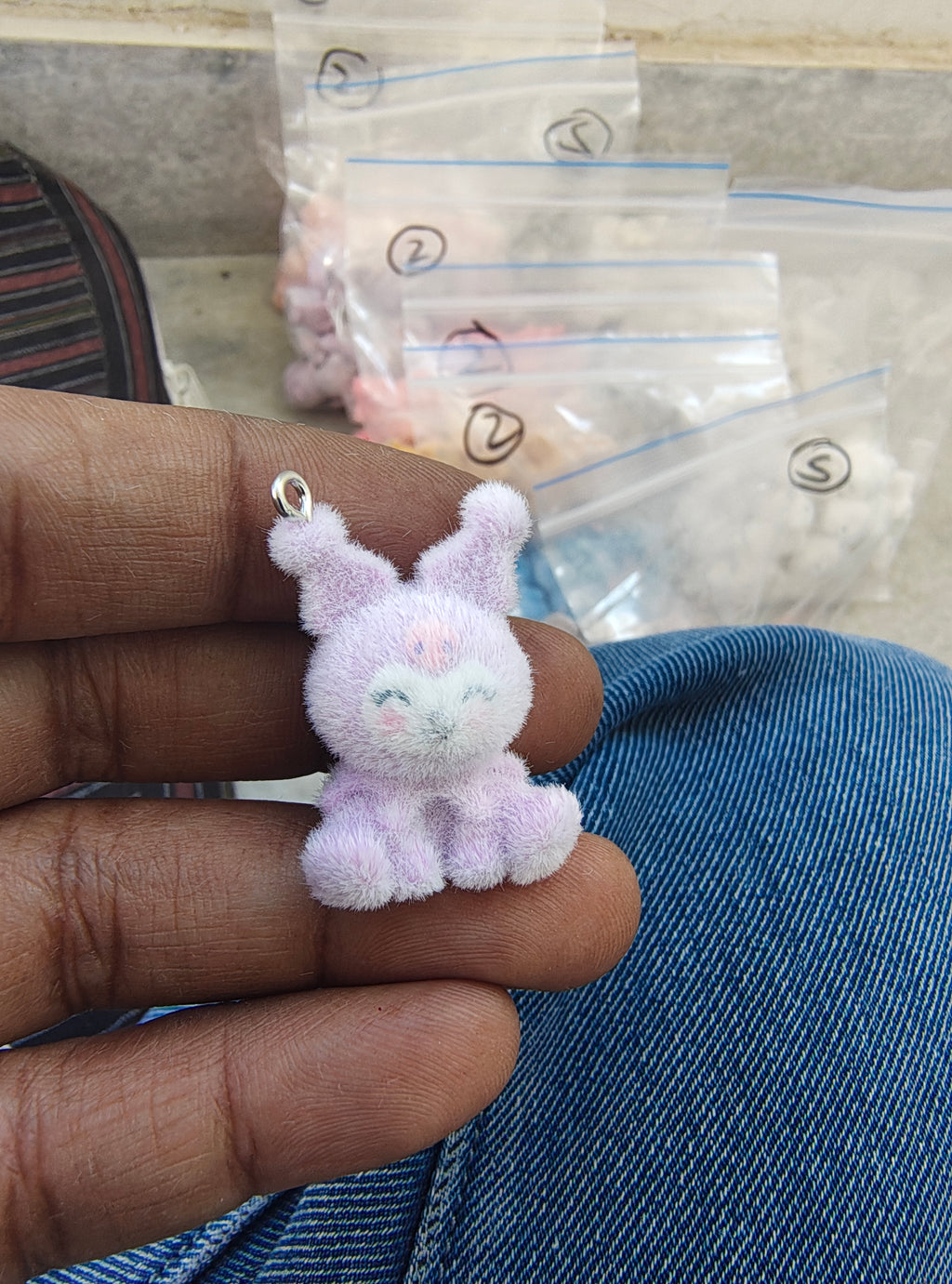 Purple snitch fur charm