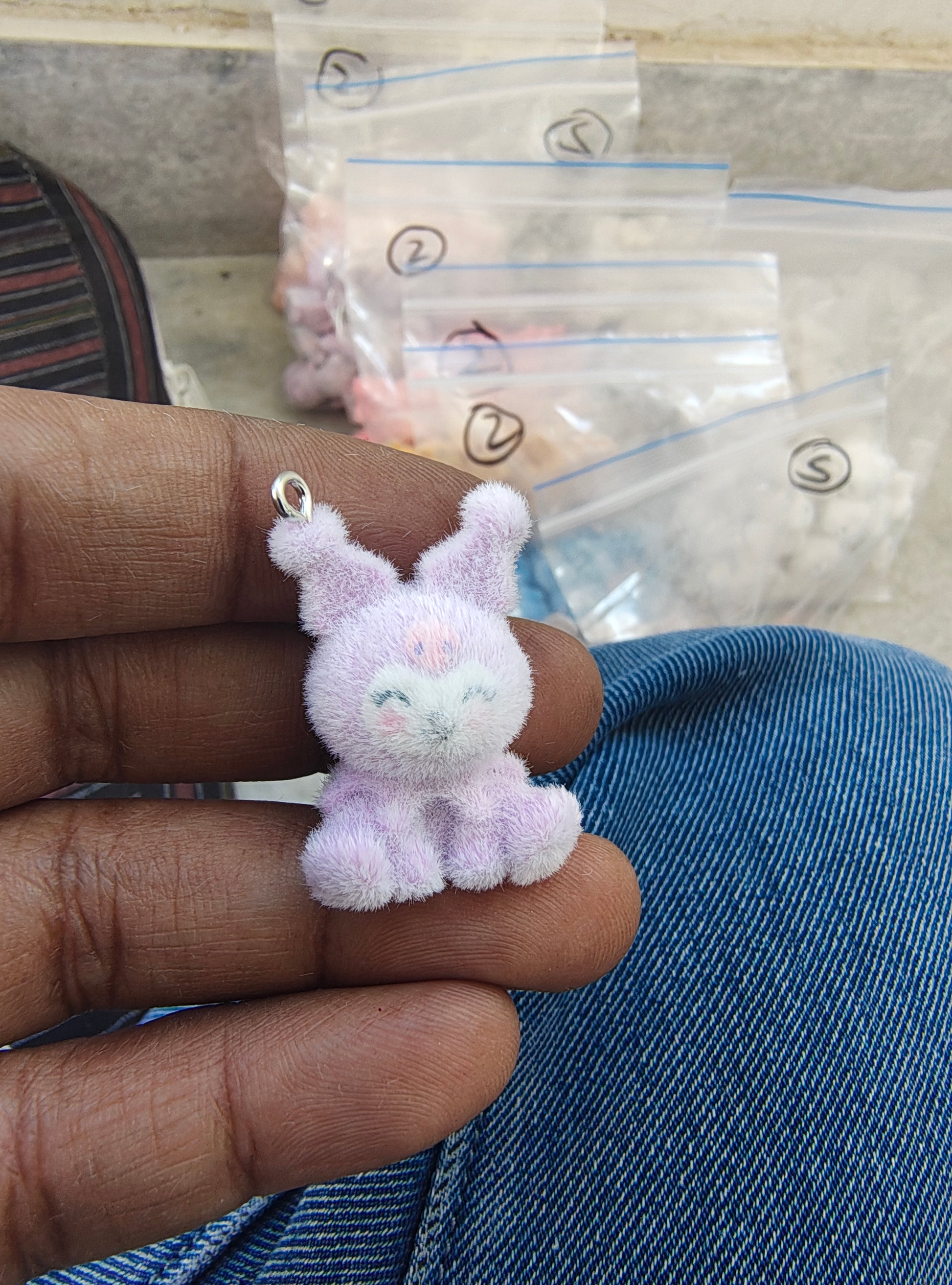 Purple snitch fur charm