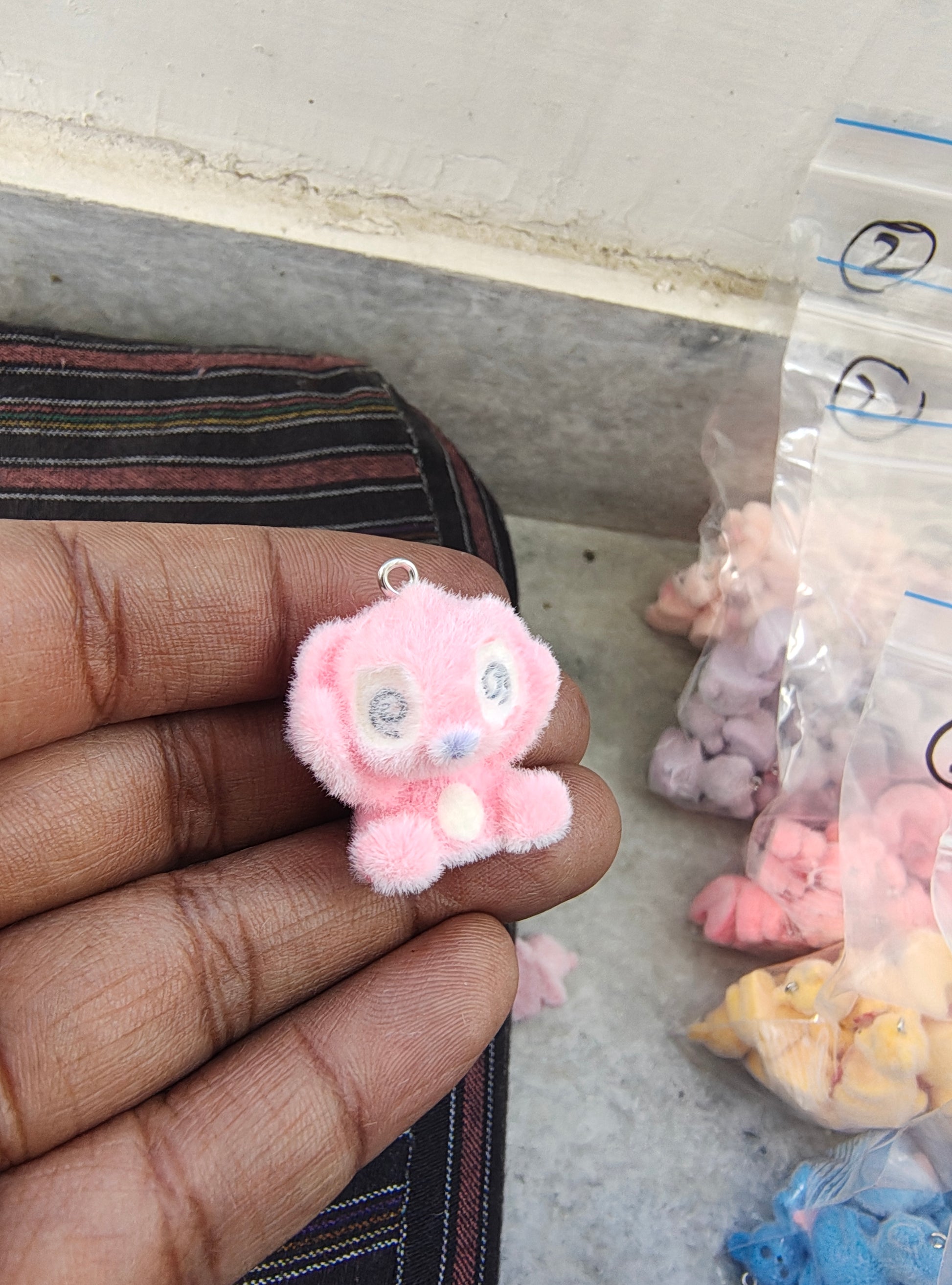 Pink snitch fur charm