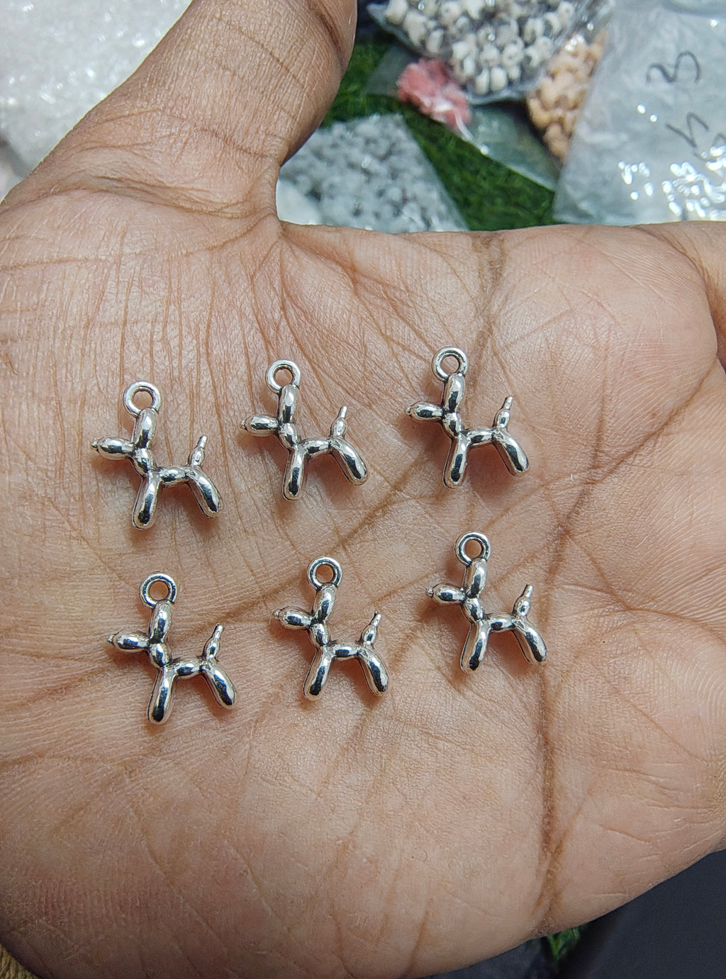 Small metal dog charm