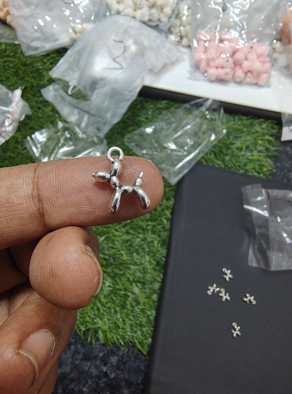 Small metal dog charm